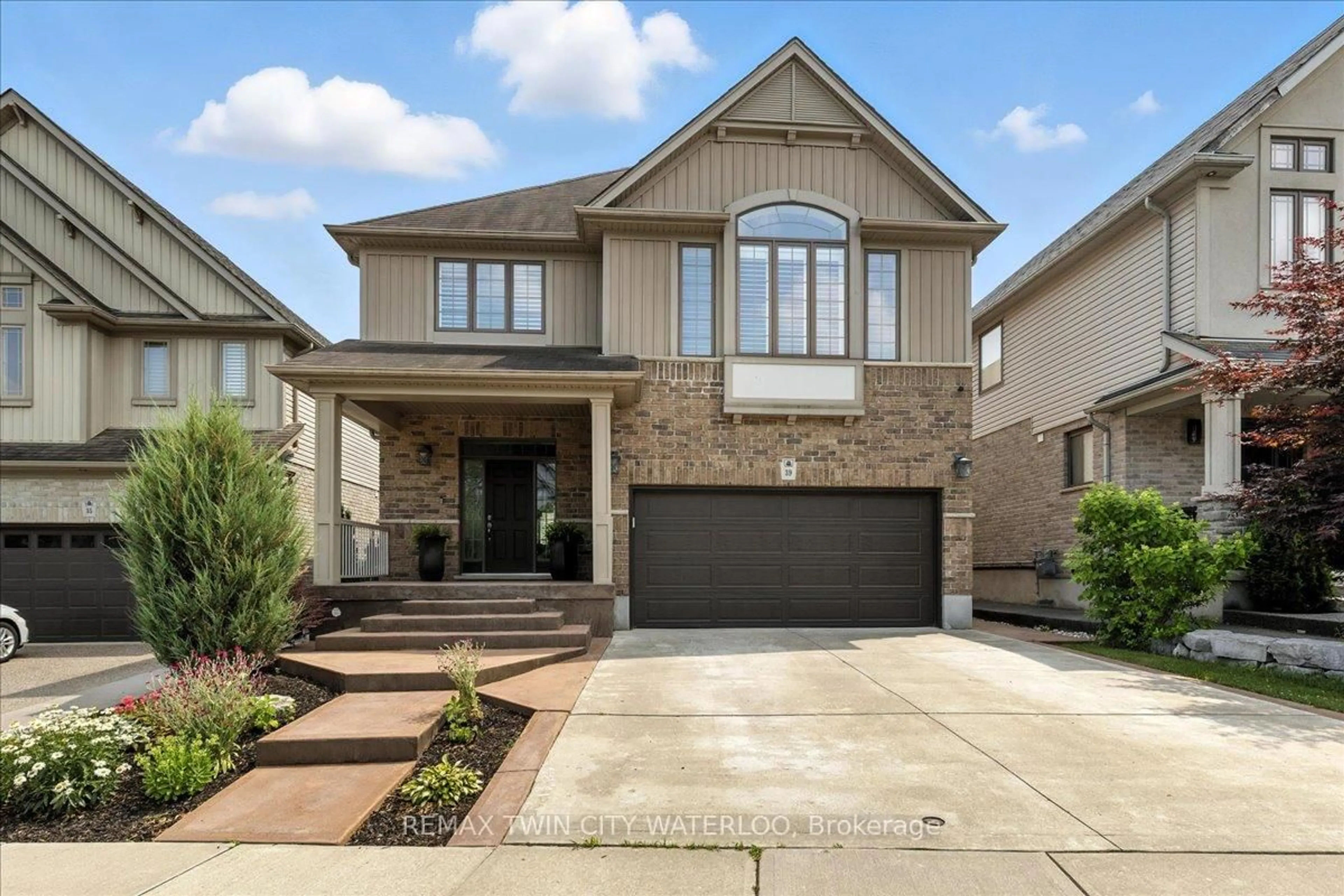 Home with brick exterior material, street for 39 Deer Creek St, Kitchener Ontario N2A 0E7