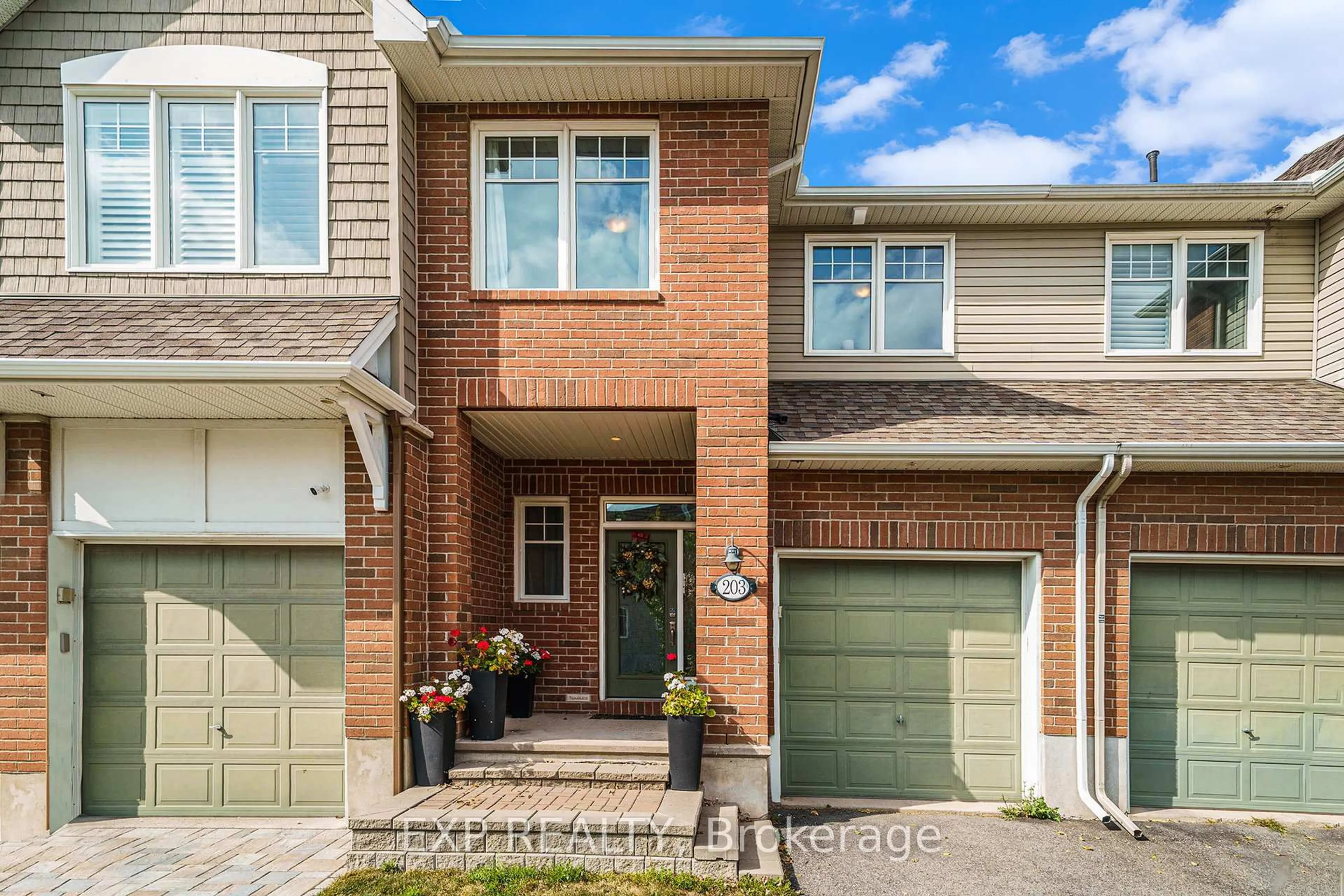 Home with brick exterior material, street for 203 Brambling Way, Ottawa Ontario K2J 5V5