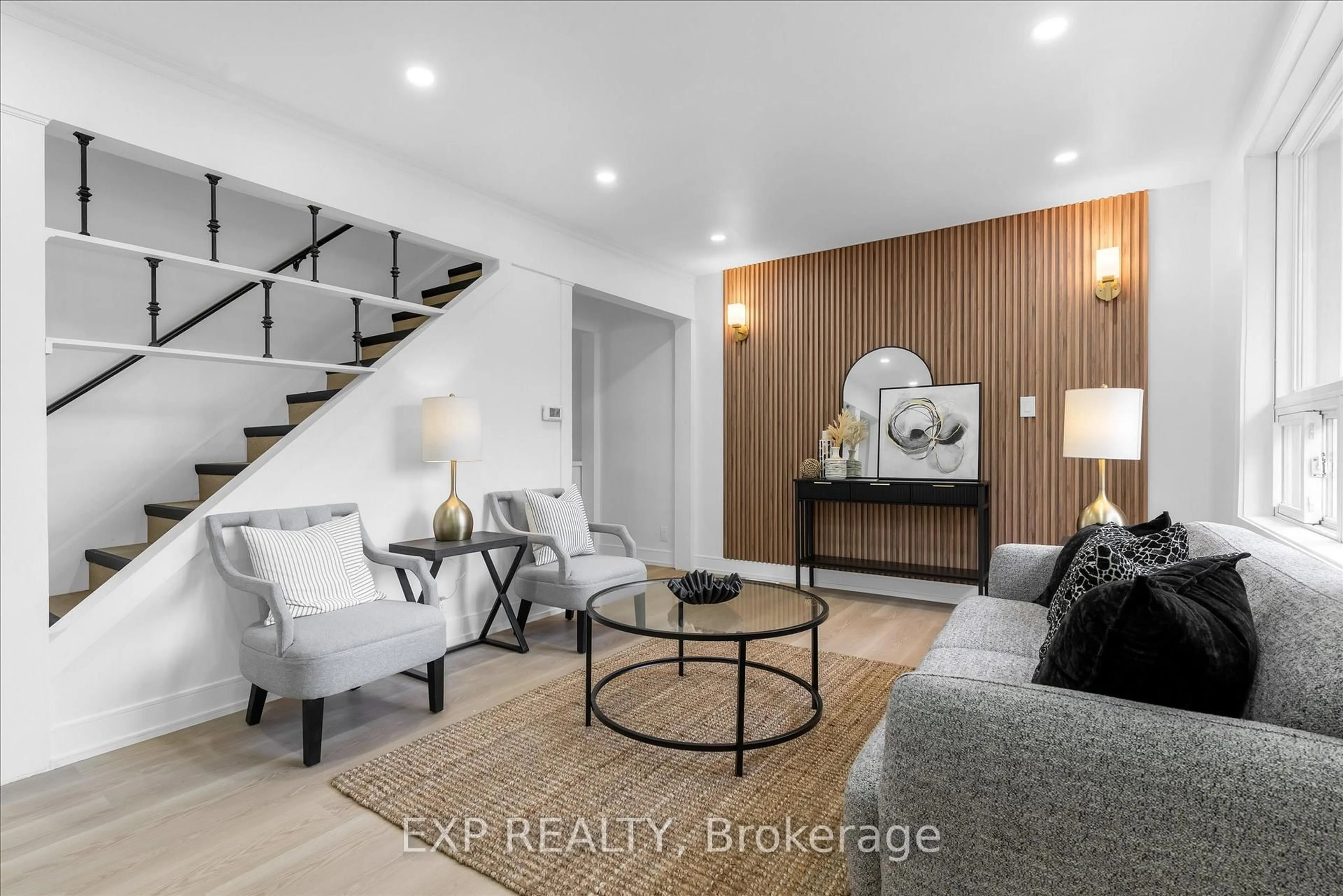 Living room with furniture, wood/laminate floor for 24 Eaton Pl, Hamilton Ontario L8H 1N7