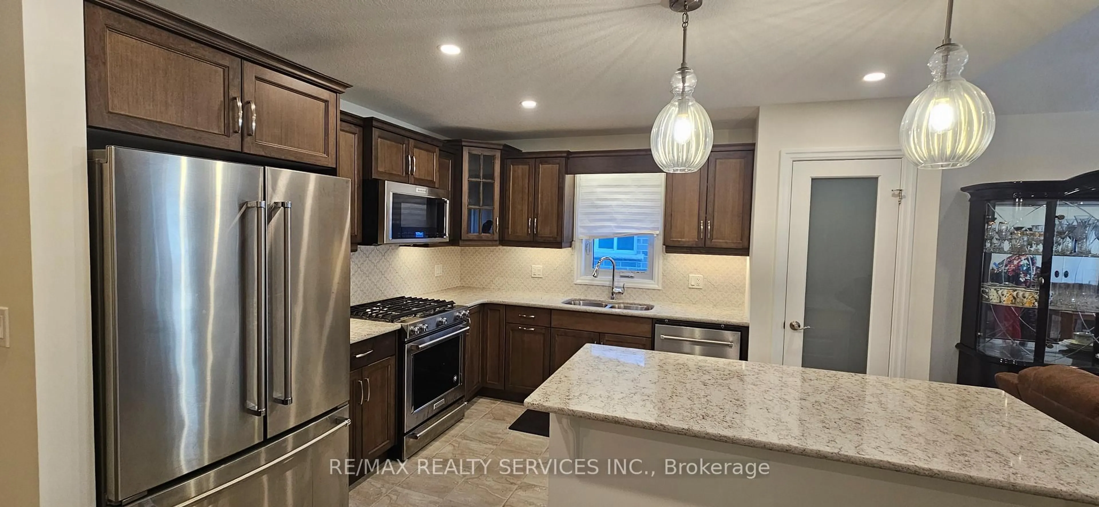 Open concept kitchen, ceramic/tile floor for 64 Ambrosia Path, St. Thomas Ontario N5R 0L4