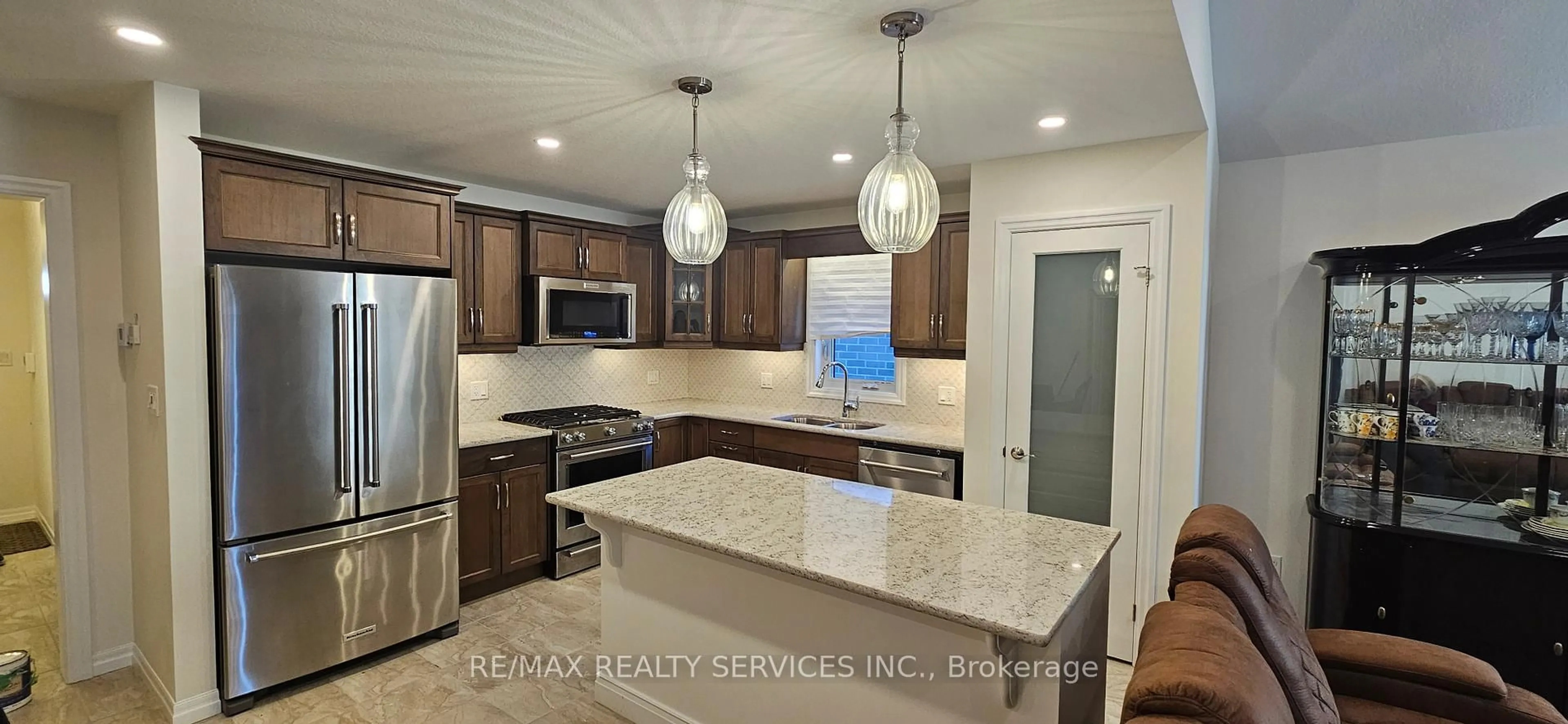 Open concept kitchen, ceramic/tile floor for 64 Ambrosia Path, St. Thomas Ontario N5R 0L4