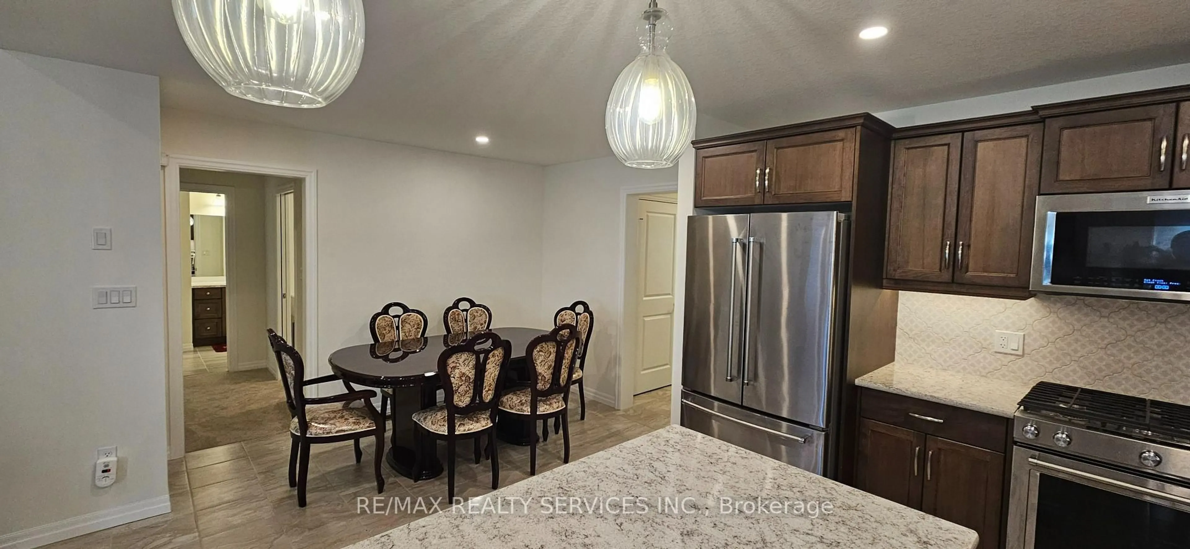 Open concept kitchen, ceramic/tile floor for 64 Ambrosia Path, St. Thomas Ontario N5R 0L4