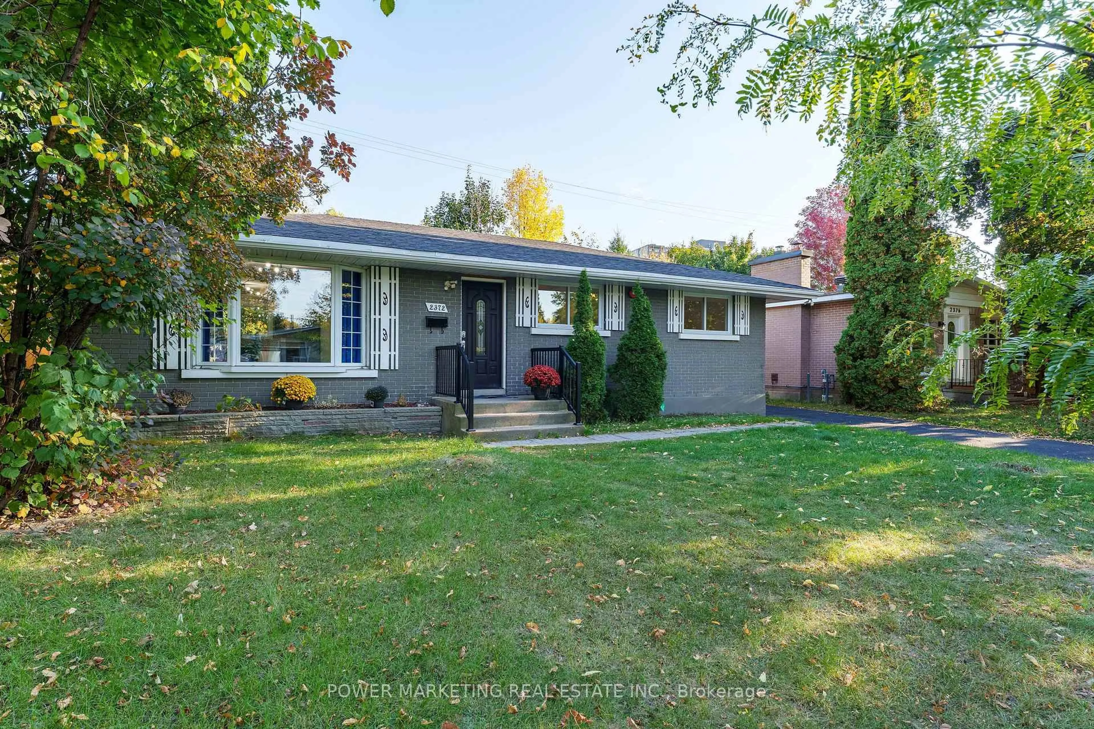 Home with vinyl exterior material, street for 2372 Riley Ave, Ottawa Ontario K2C 1J9