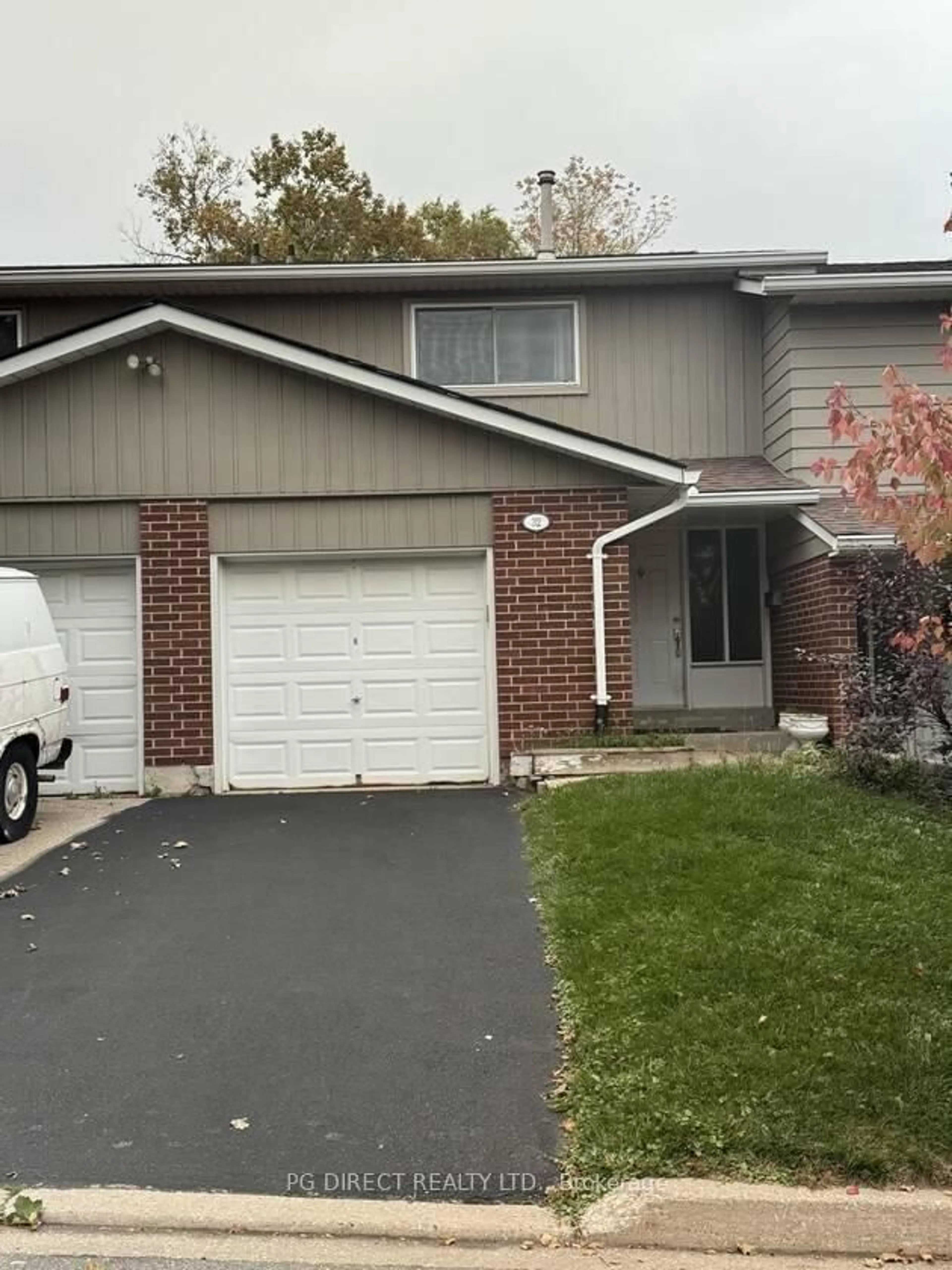 Home with vinyl exterior material, street for 16 Hadati Rd #32, Guelph Ontario N1E 6M2