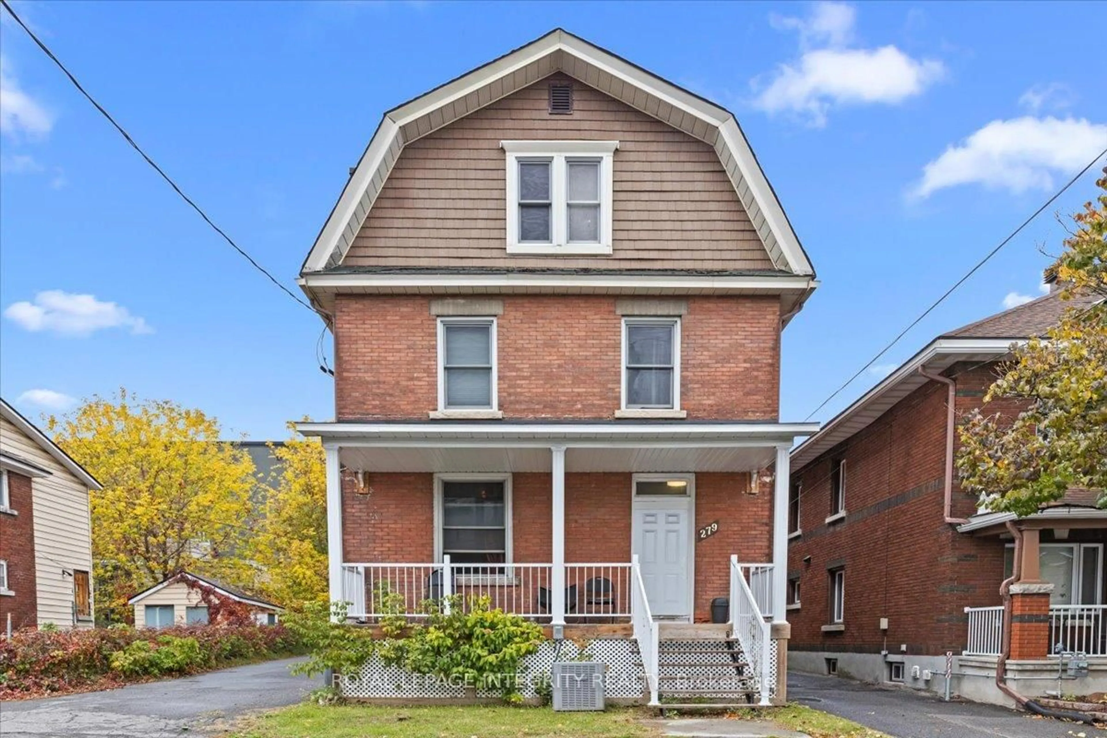 Home with brick exterior material, street for 279 Somerset St, Ottawa Ontario K1N 6V7