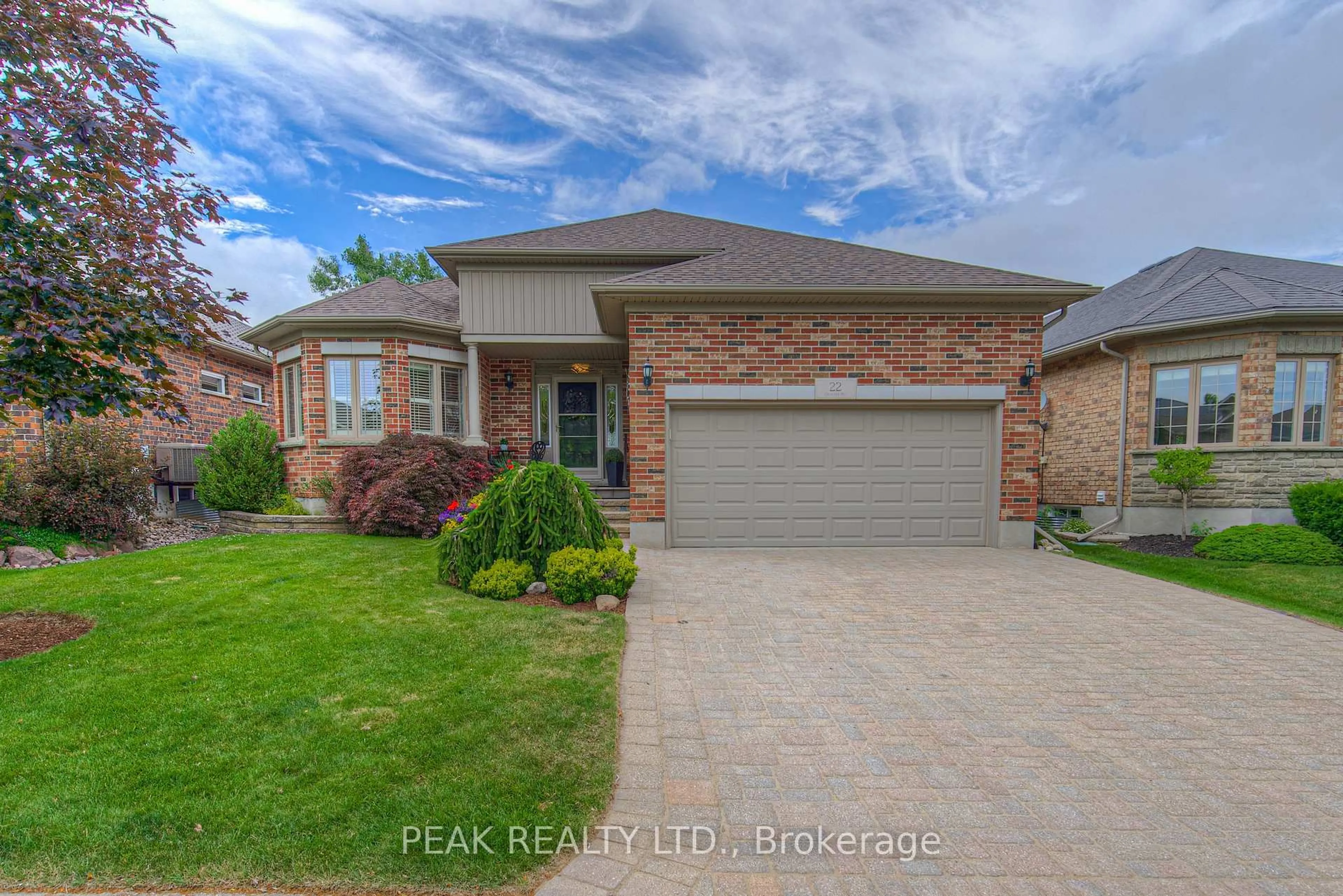 Home with brick exterior material, street for 22 Orchard Way, Wilmot Ontario N3A 4P7
