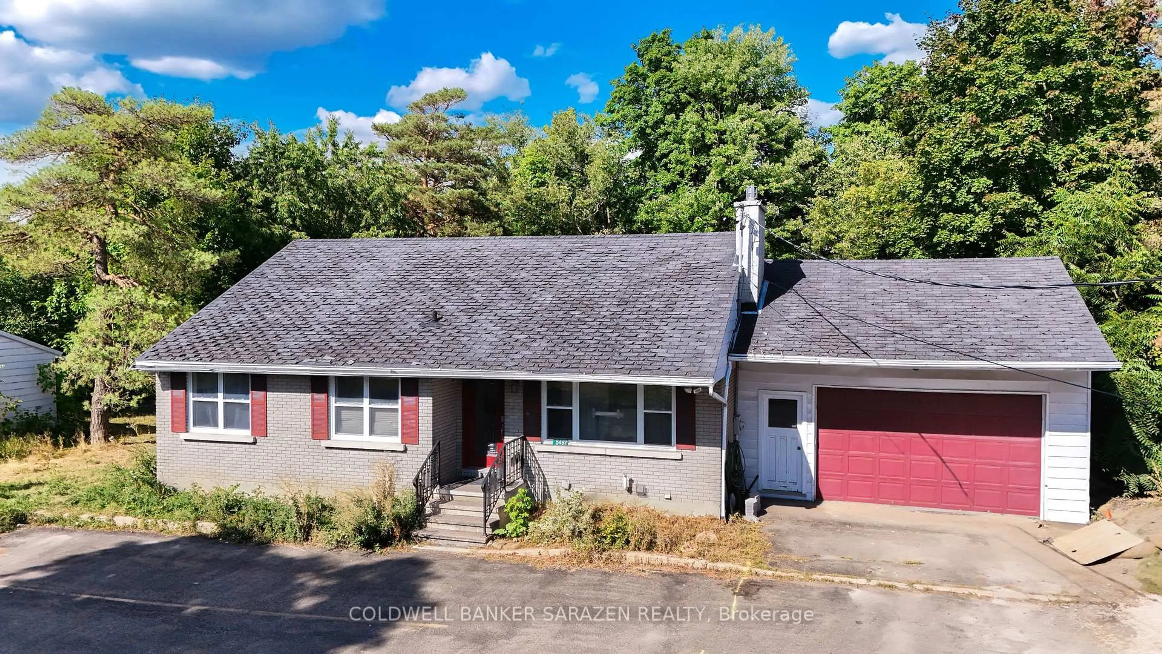 A pic from outside/outdoor area/front of a property/back of a property/a pic from drone, street for 5497 Manotick Main St, Ottawa Ontario K4M 0E2