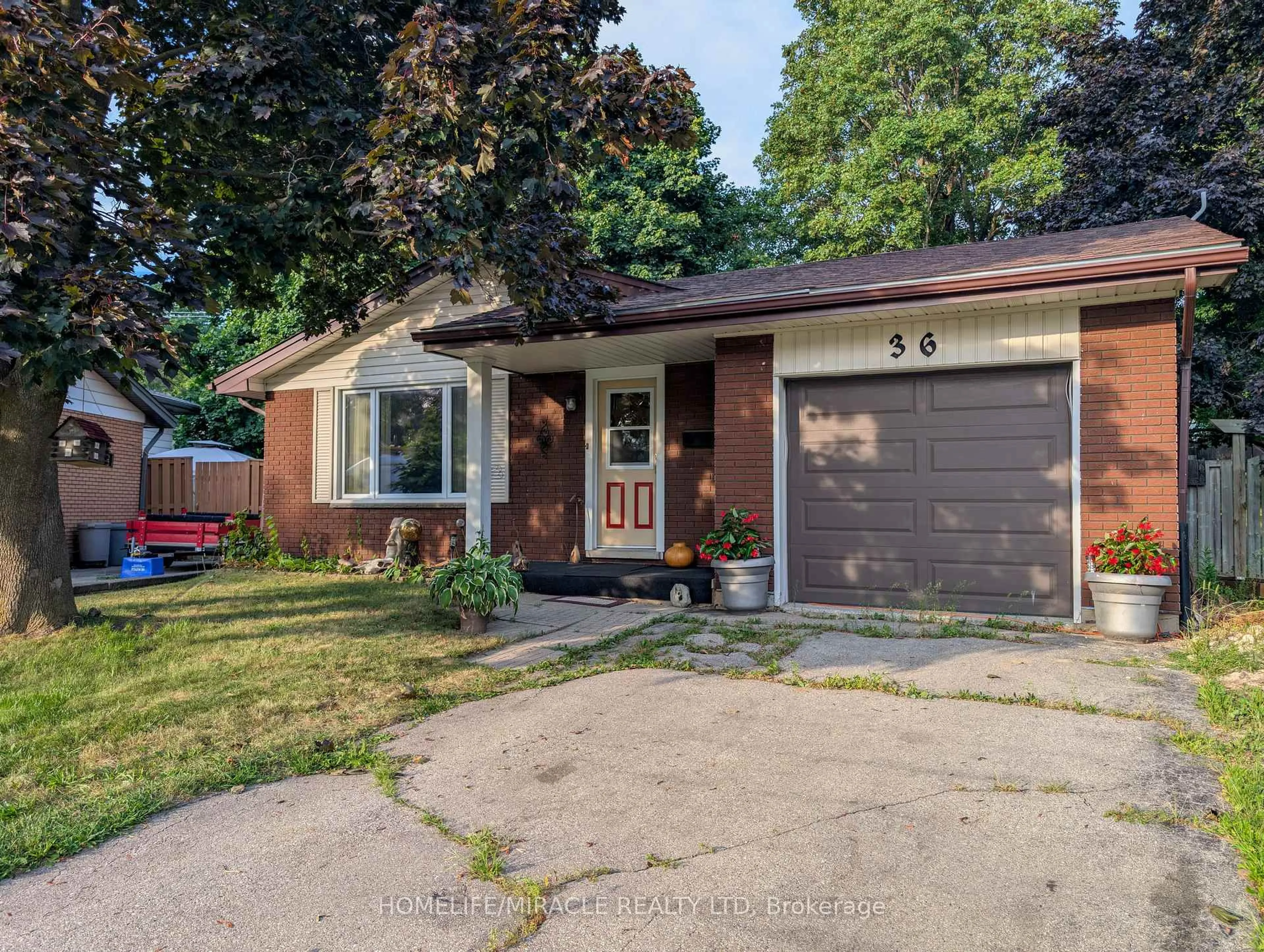 Home with brick exterior material, street for 36 Arrowhead Pl, Kitchener Ontario N2P 1C3
