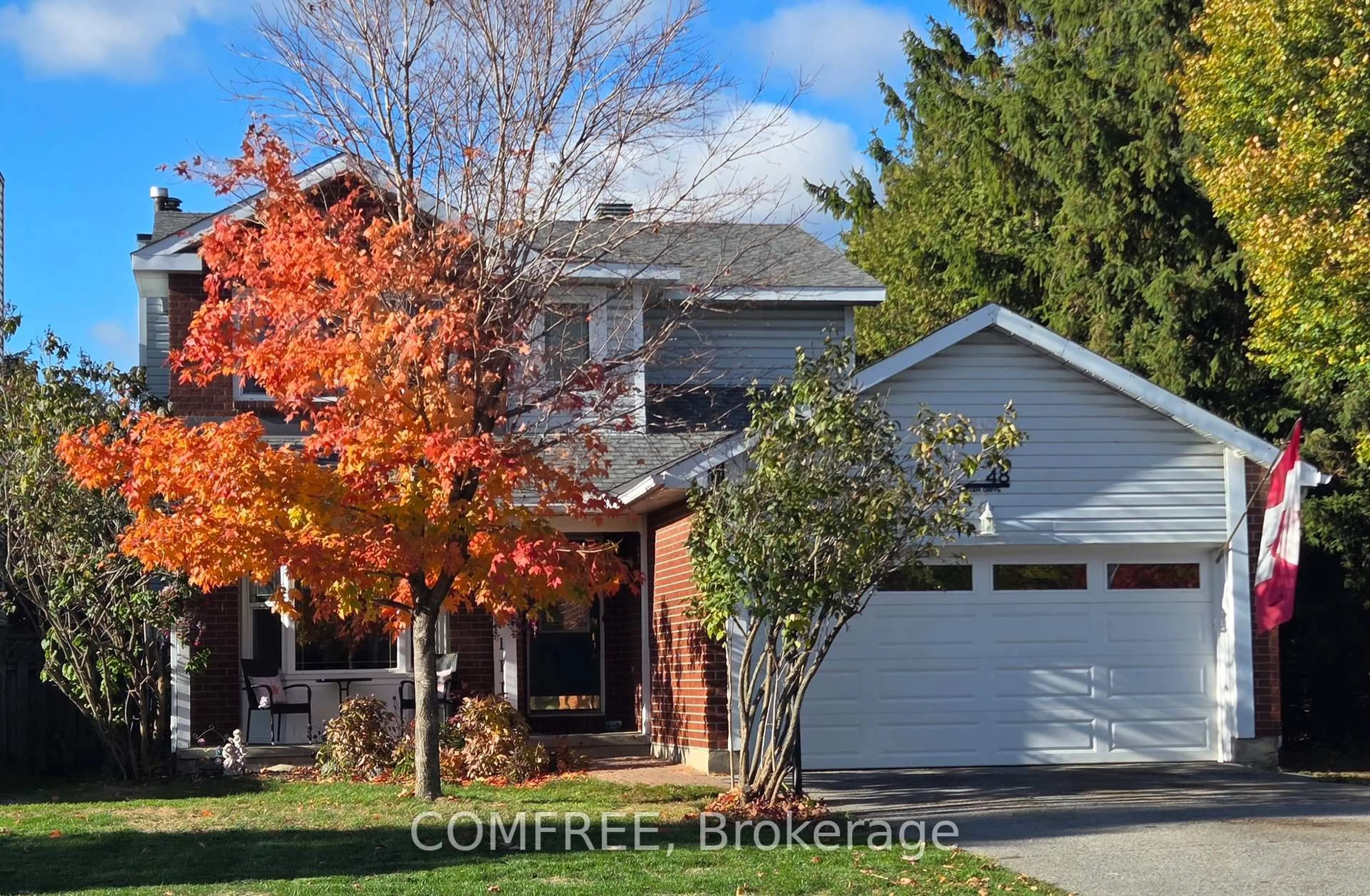 Home with brick exterior material, street for 48 Tartan Dr, Barrhaven Ontario K2J 2V5