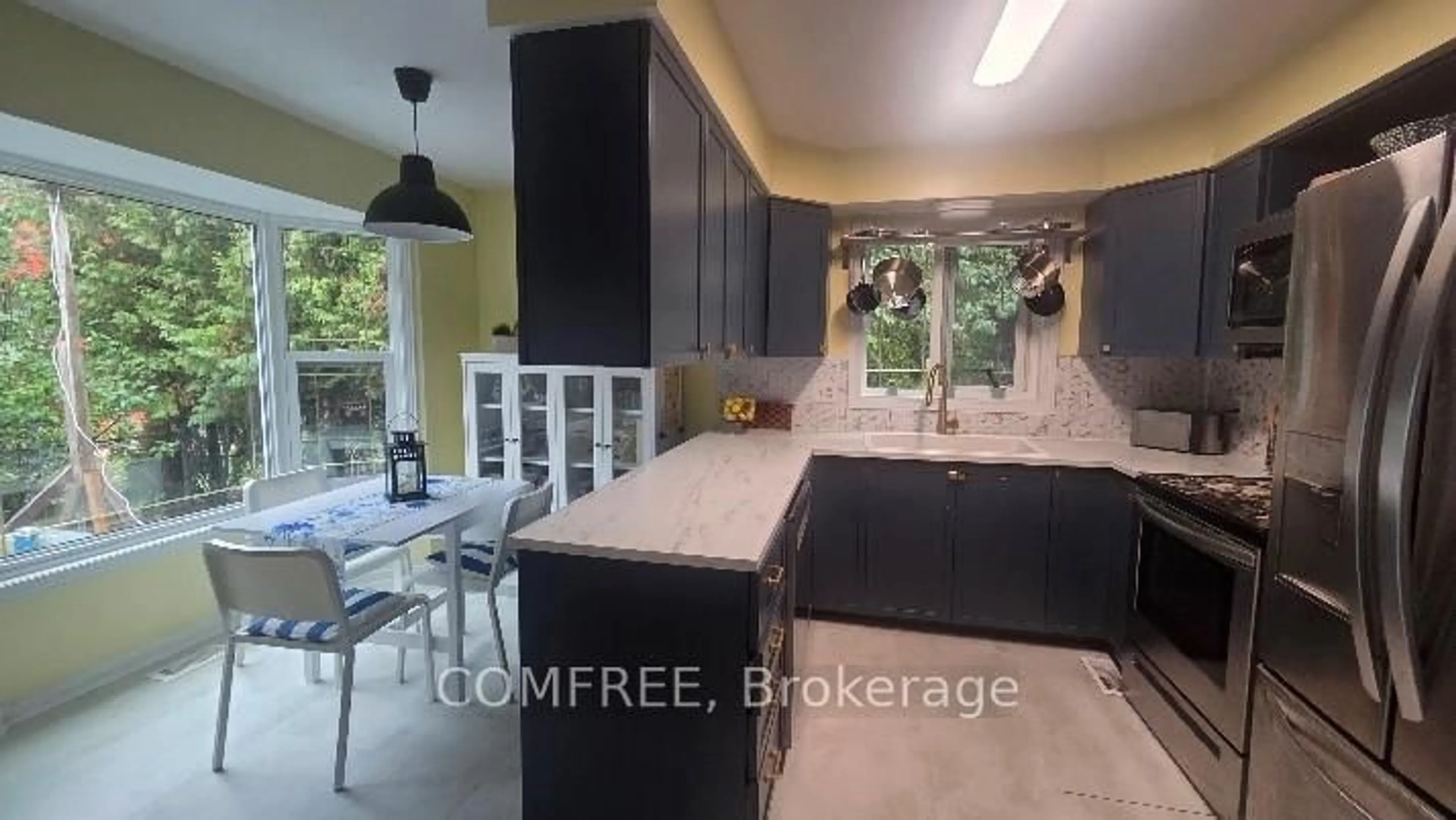 Contemporary kitchen, ceramic/tile floor for 48 Tartan Dr, Barrhaven Ontario K2J 2V5