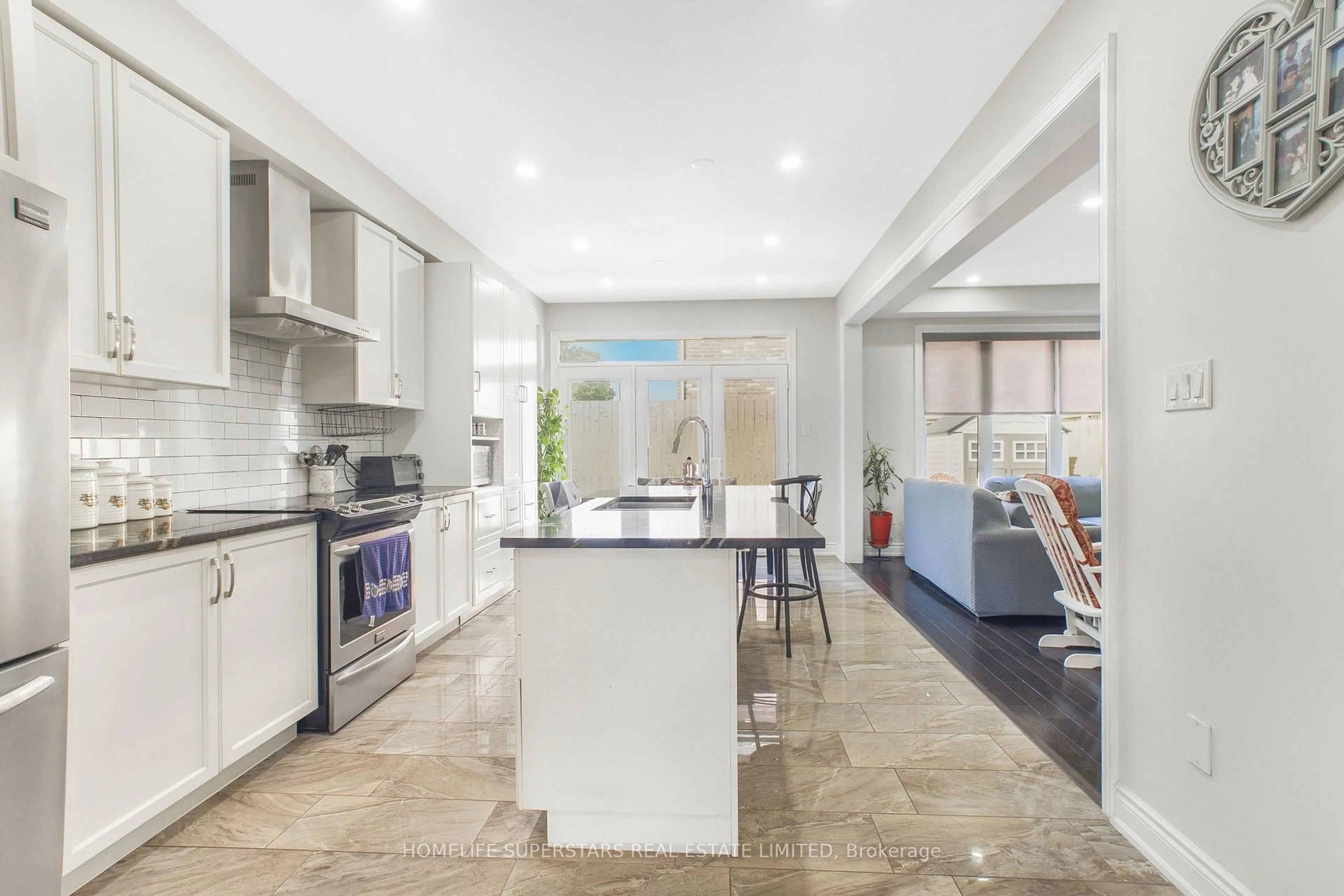 Open concept kitchen, ceramic/tile floor for 8066 Hackberry Tr, Niagara Falls Ontario L2H 2Y6