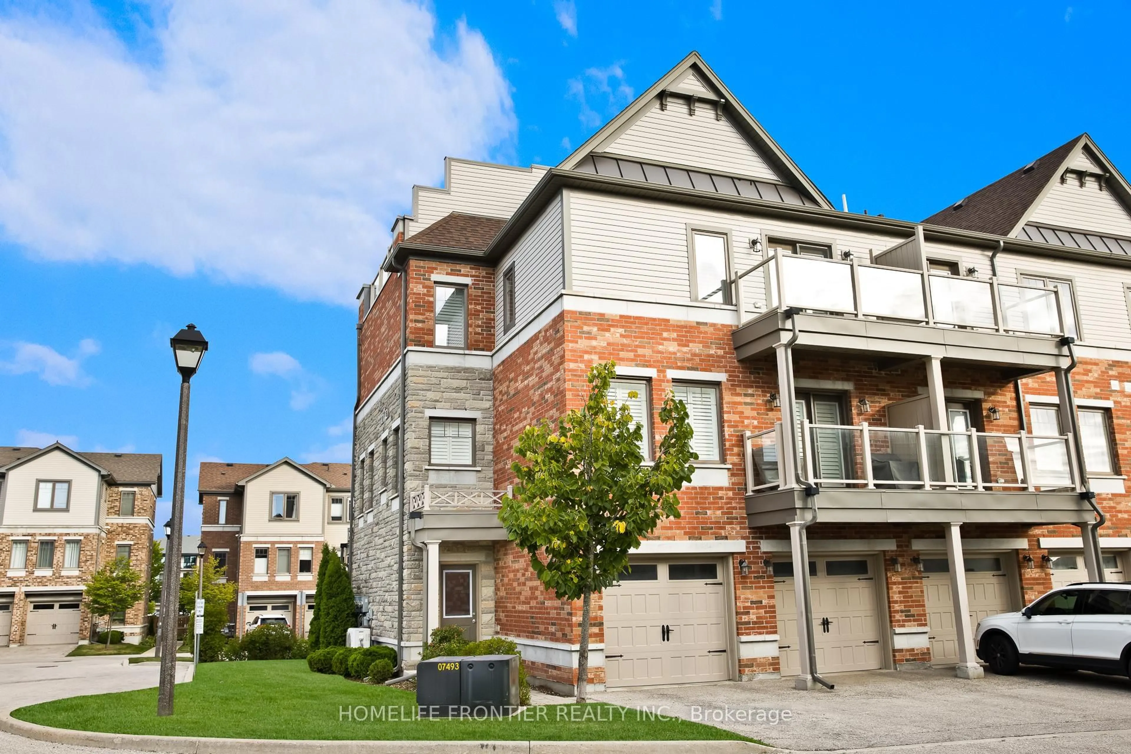 Home with brick exterior material, street for 39 Kay Cres #32, Guelph Ontario N1L 0N5