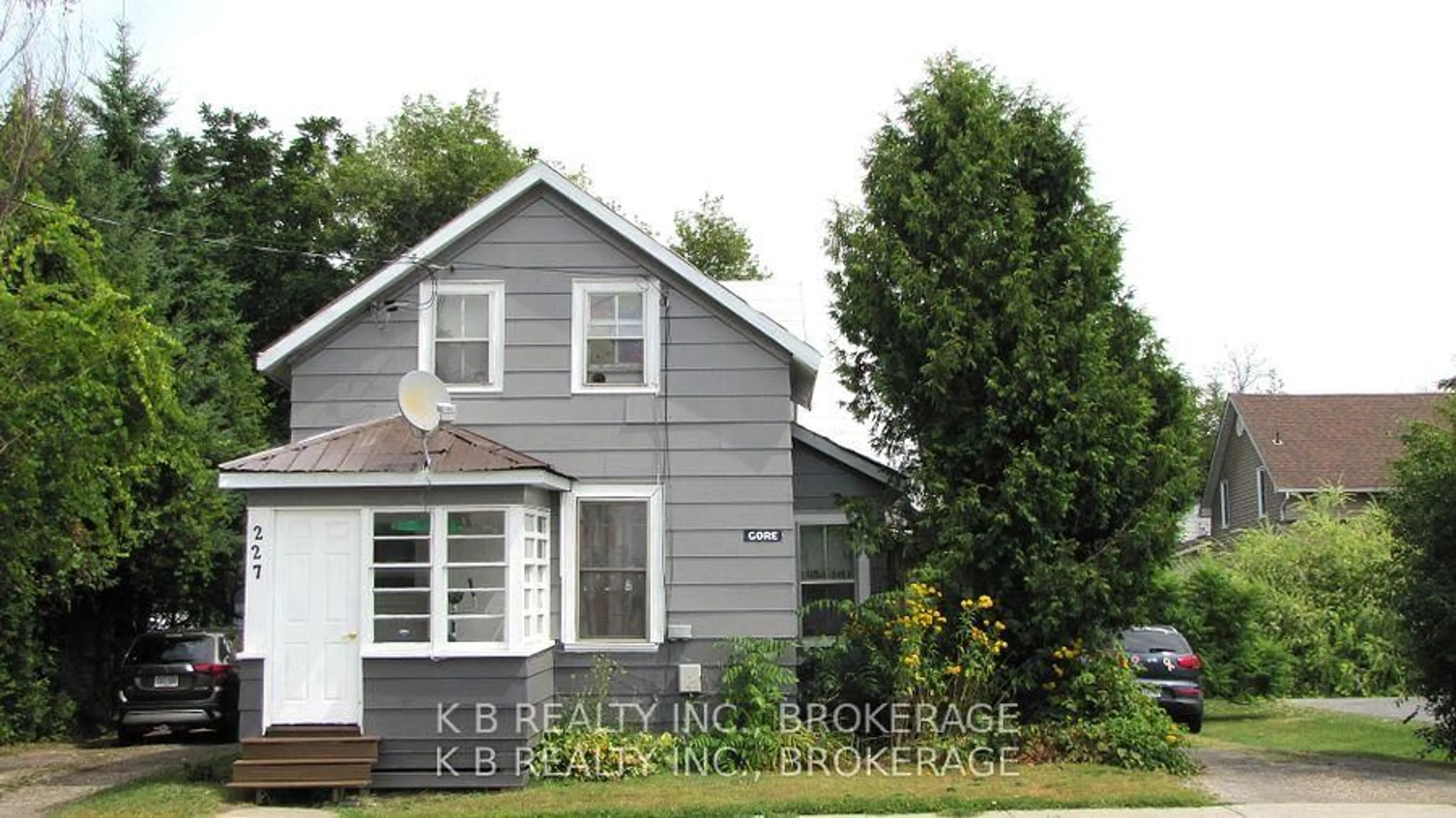 Home with vinyl exterior material, street for 229 Gore St, Perth Ontario K7H 1K6