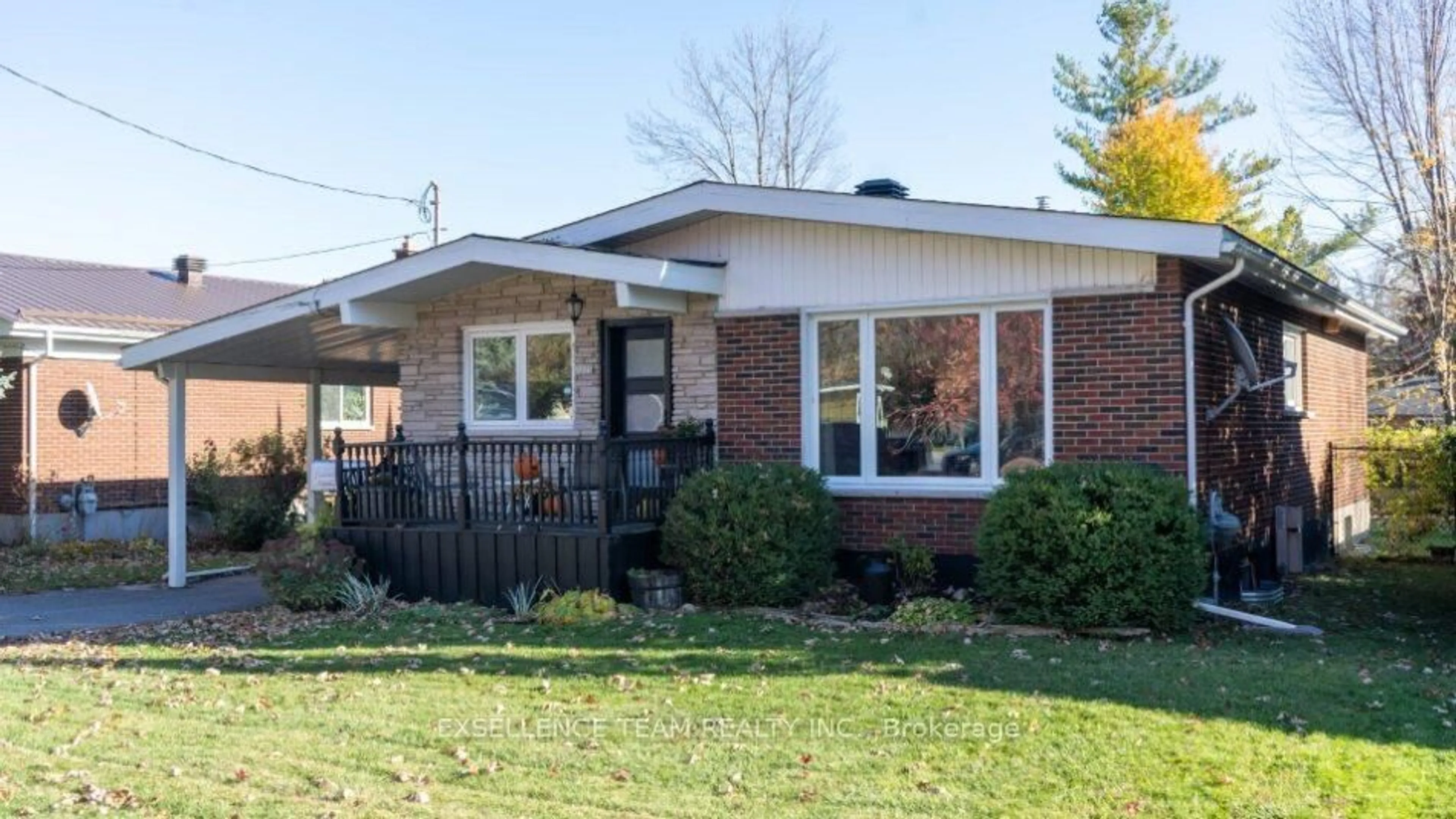 Home with brick exterior material, street for 1010 Queen St, Cornwall Ontario K6J 1P4