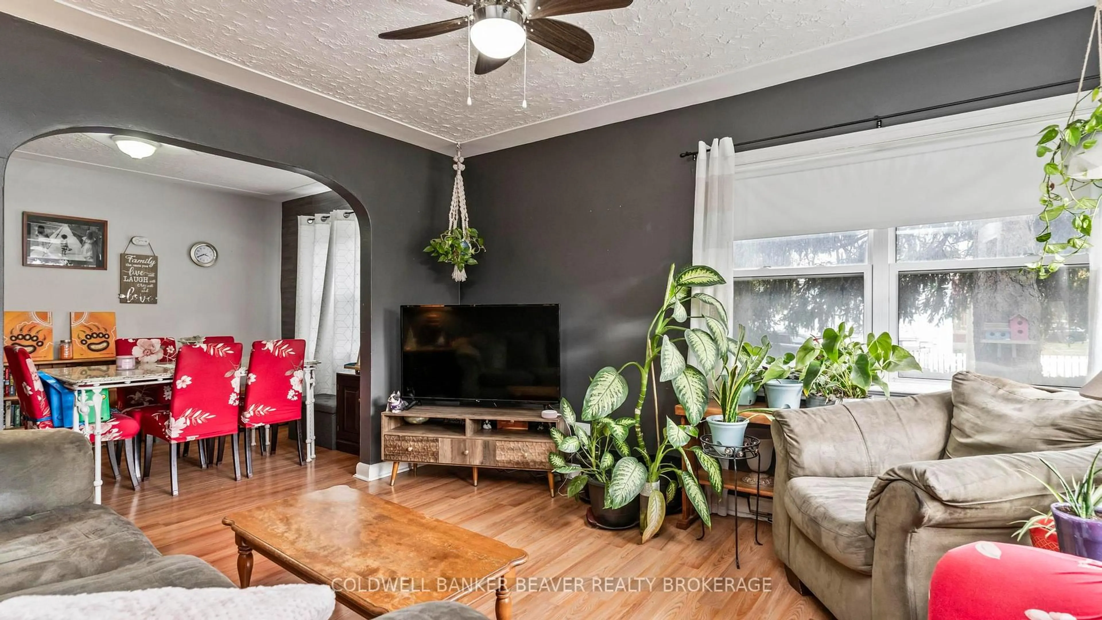 Living room with furniture, wood/laminate floor for 20 Emery St, London South Ontario N6J 1R4