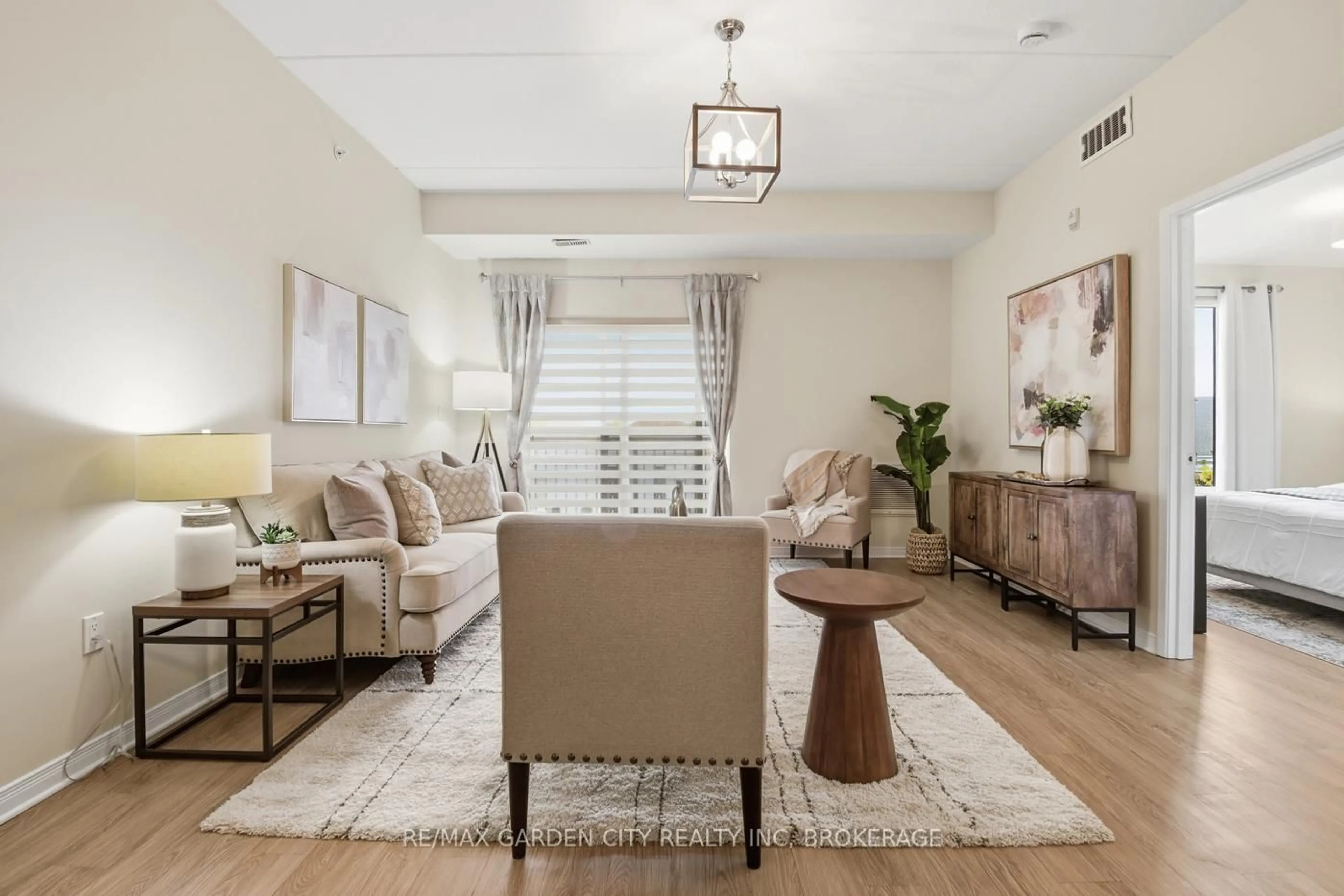 Living room with furniture, unknown for 16 Sullivan Ave #307, Thorold Ontario L2V 2Y2