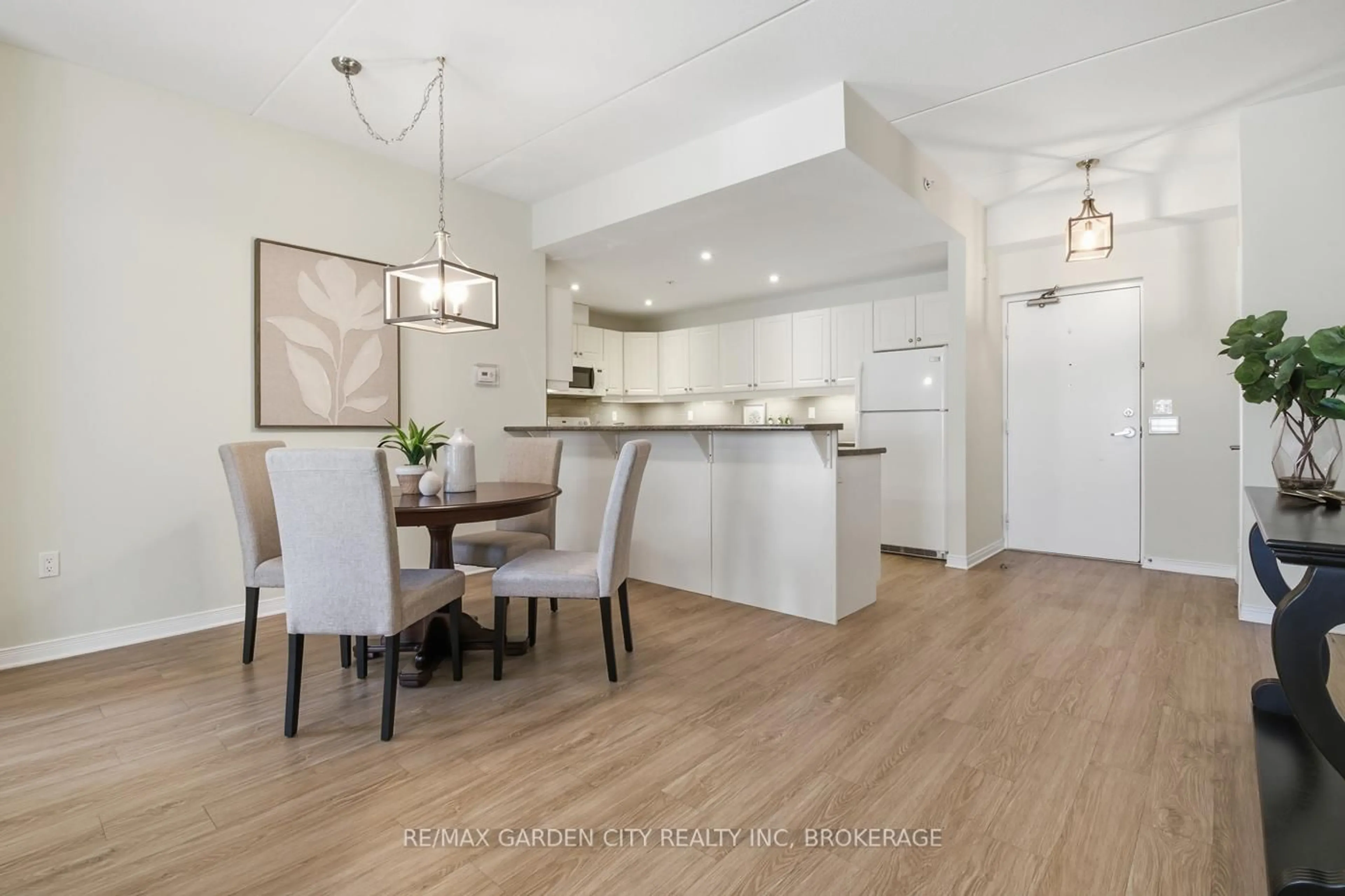 Open concept kitchen, wood/laminate floor for 16 Sullivan Ave #307, Thorold Ontario L2V 2Y2