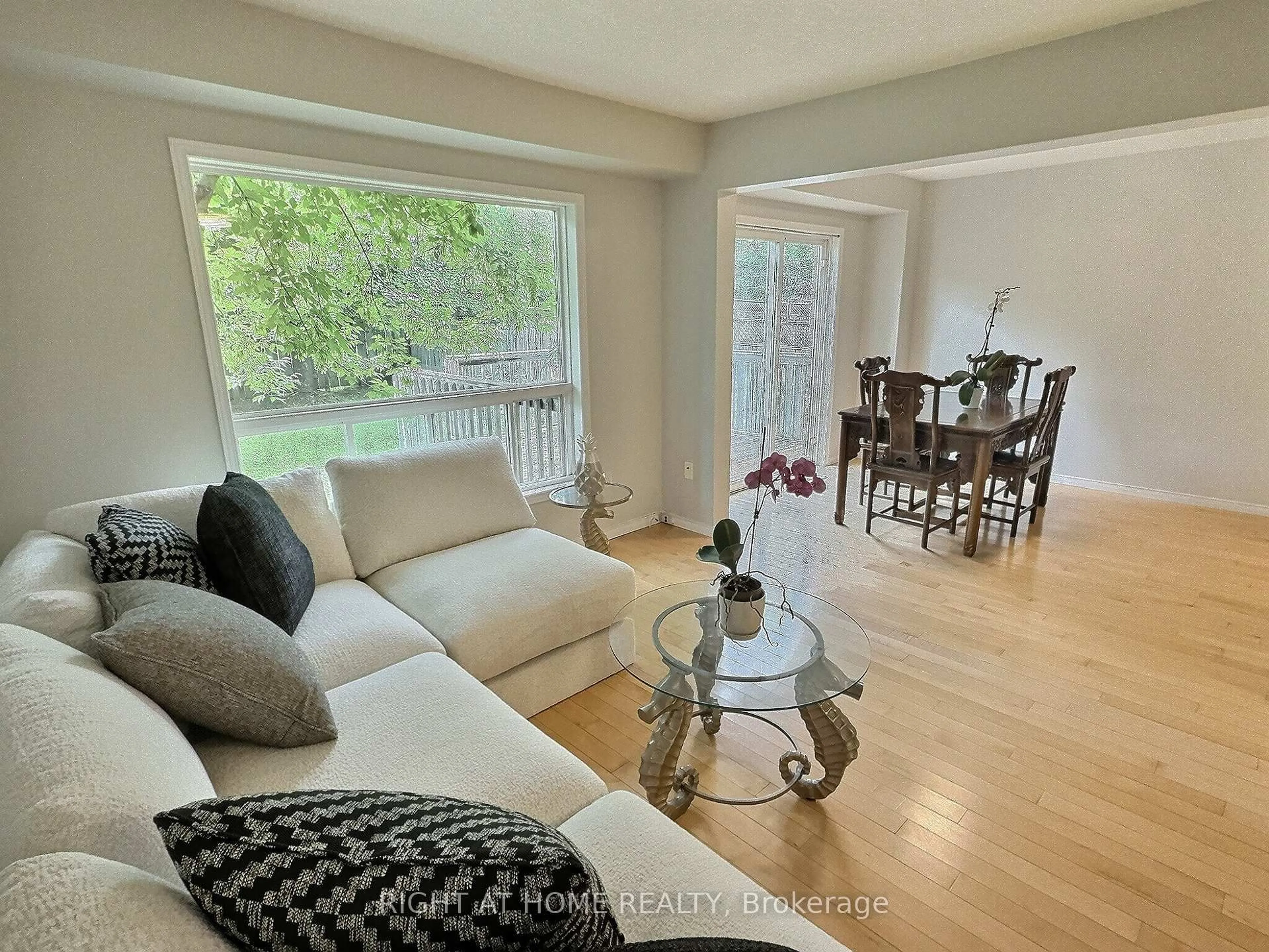 Living room with furniture, wood/laminate floor for 385 Havendale Cres, Waterloo Ontario N2T 2T4
