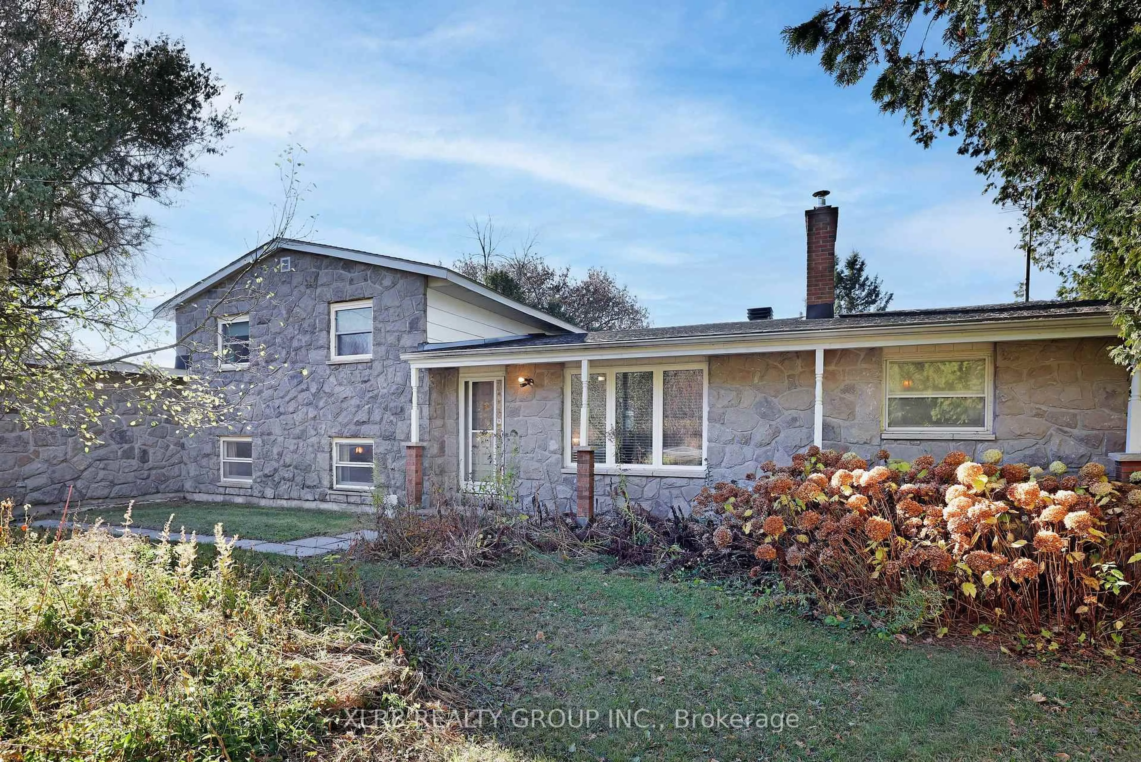 A pic from outside/outdoor area/front of a property/back of a property/a pic from drone, street for 1996 Old Carp Rd, Carp Ontario K0A 1L0