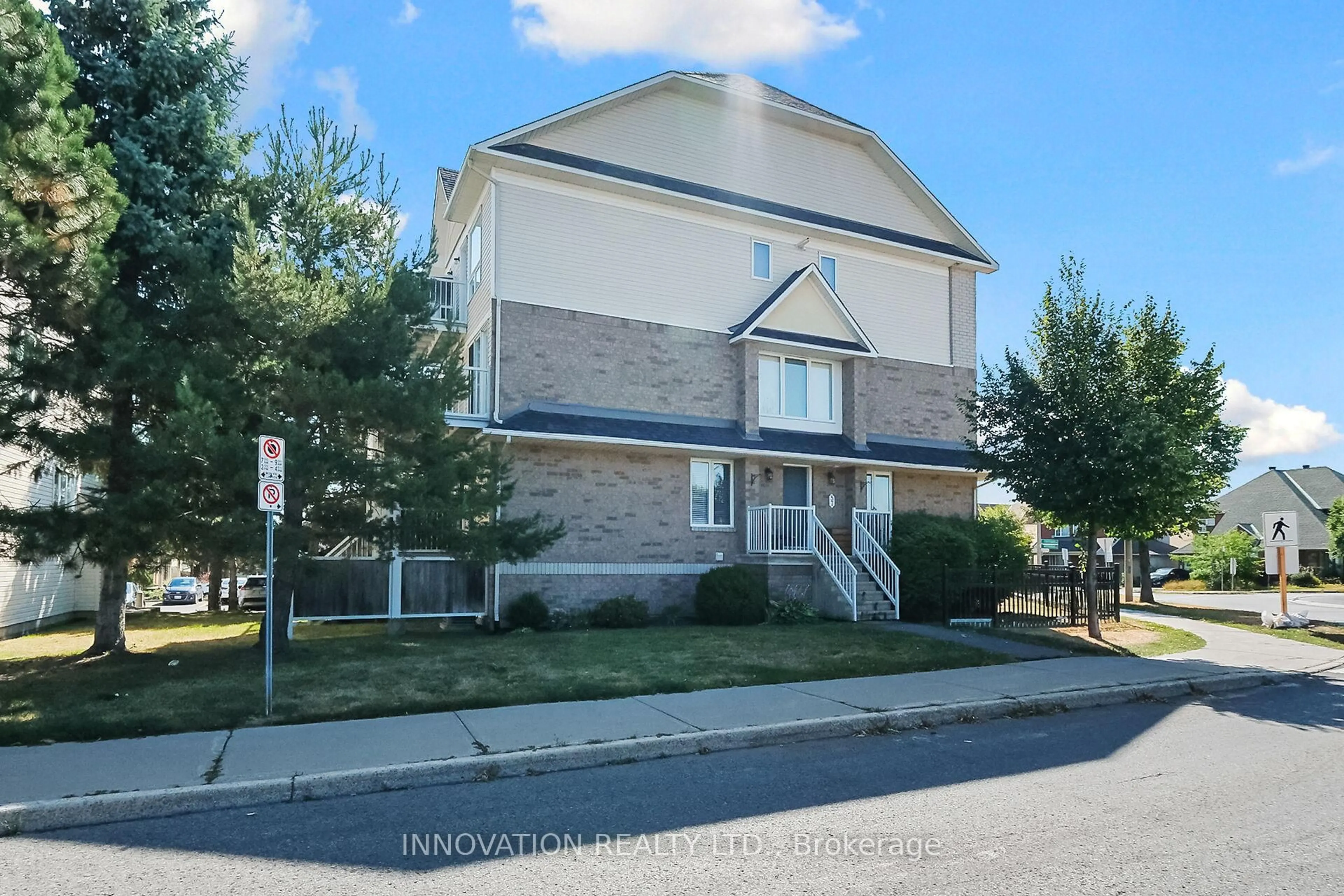 Home with vinyl exterior material, street for 57 Waterbridge Dr, Ottawa Ontario K2G 6T9