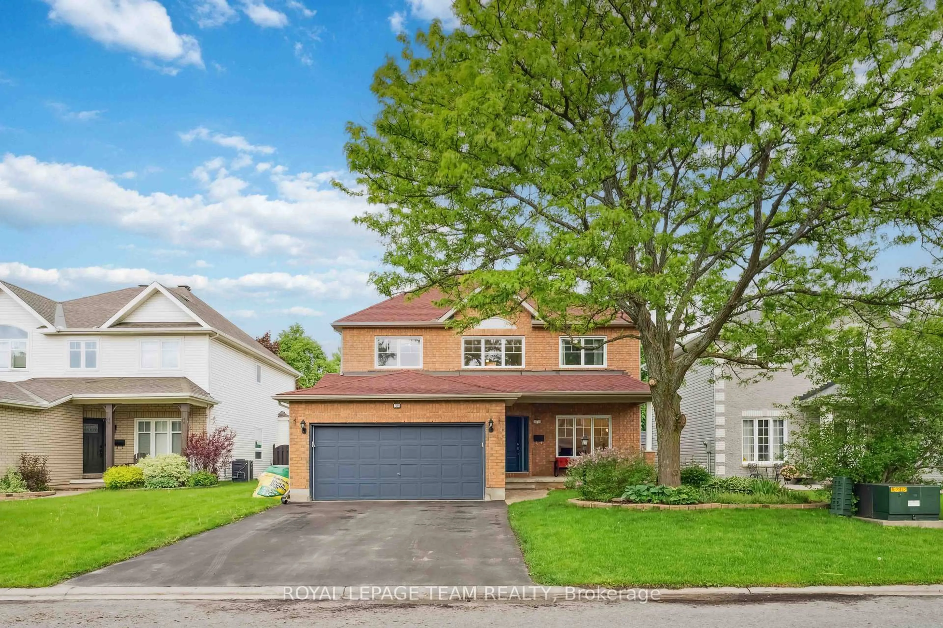 Home with brick exterior material, street for 39 Vermont Ave, Ottawa Ontario K2G 6M2