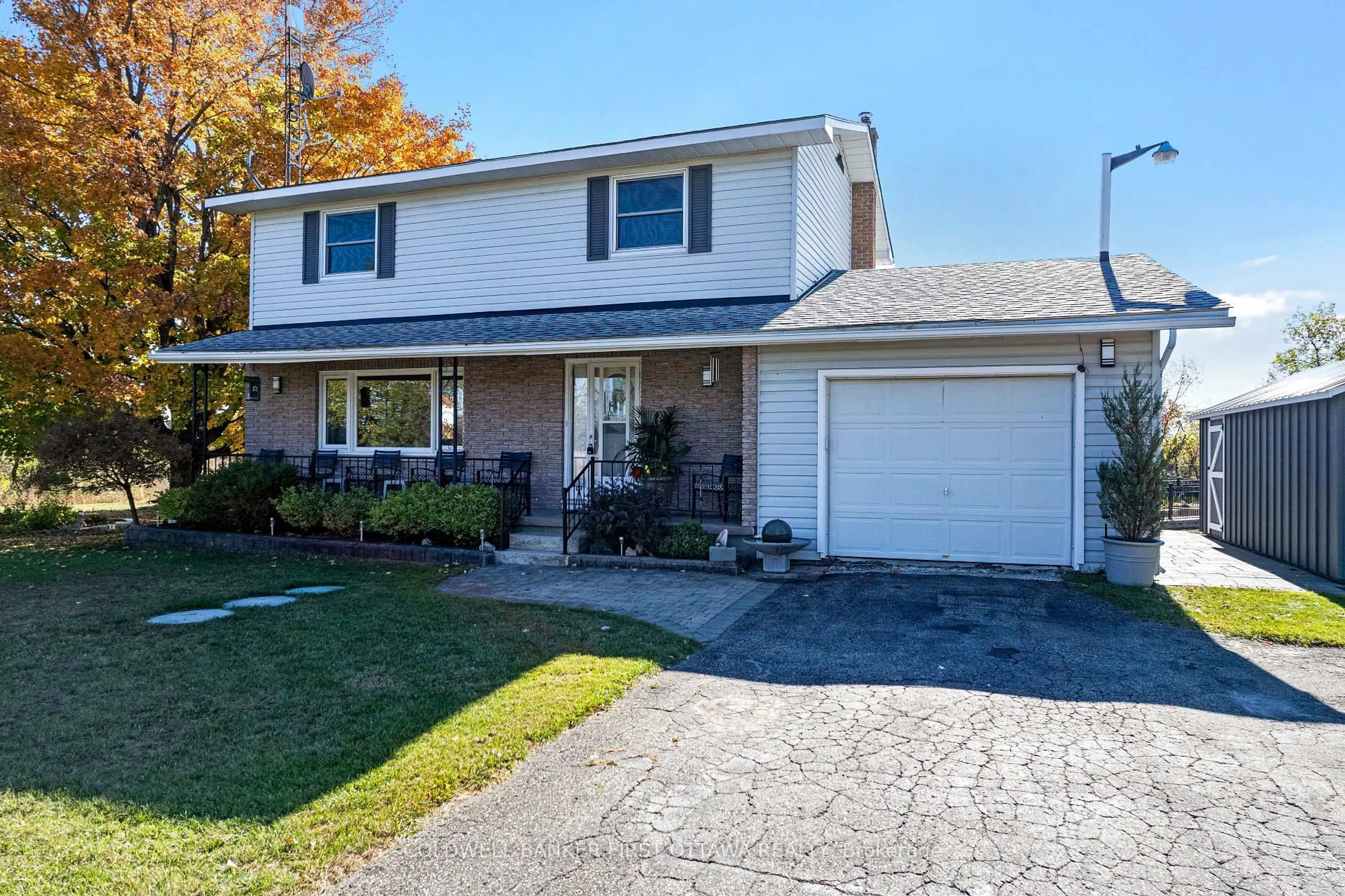 Home with vinyl exterior material, street for 1053 Mitchell Rd, Lanark Ontario K0G 1K0