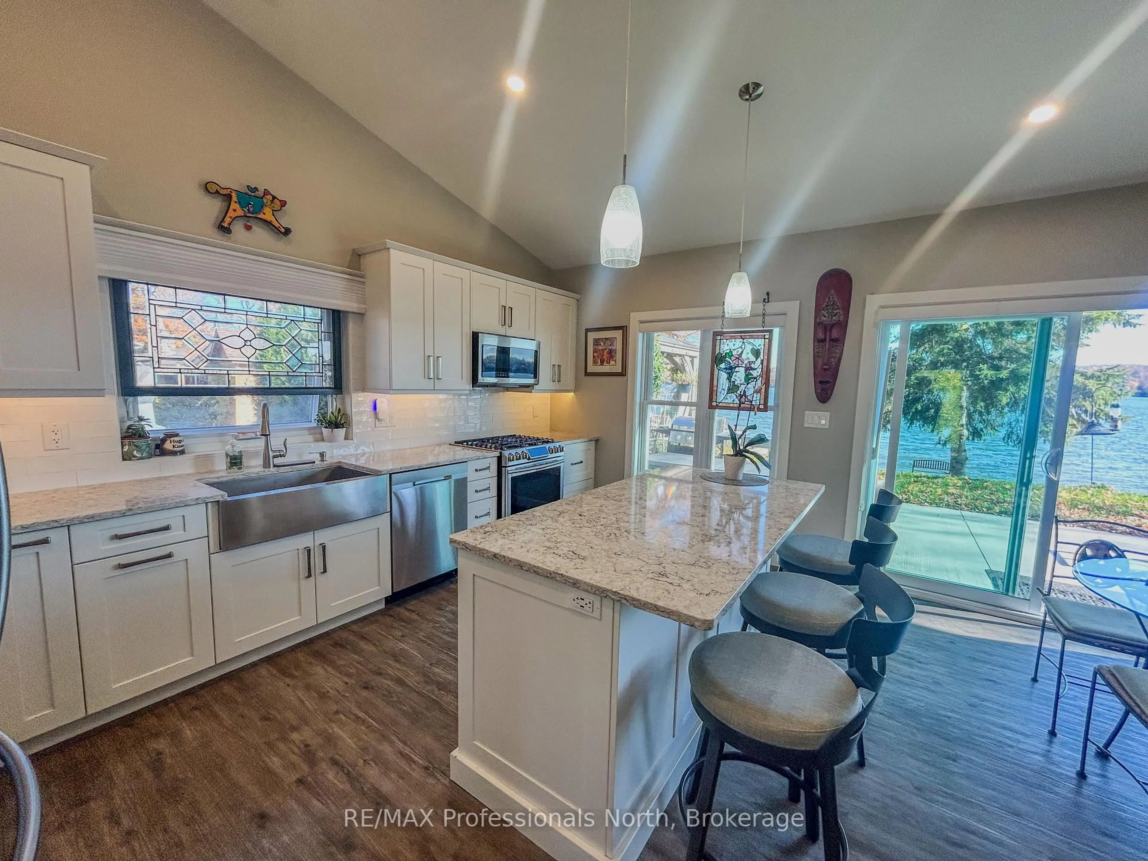 Open concept kitchen, ceramic/tile floor for 563 Dalhaven Rd, Selwyn Ontario K9J 6X2
