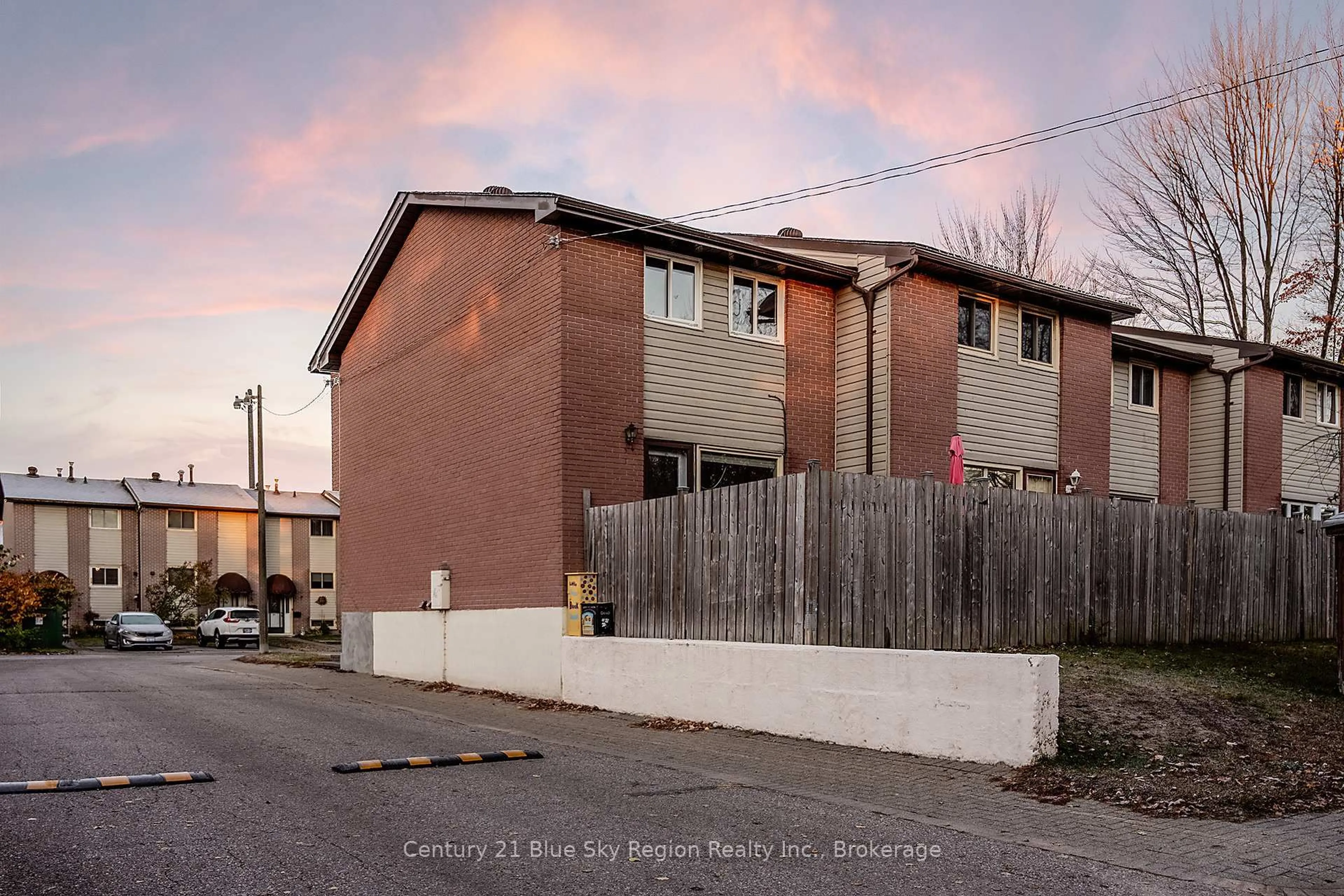 A pic from outside/outdoor area/front of a property/back of a property/a pic from drone, unknown for 450 Lakeshore Dr #D1, North Bay Ontario P1A 2E1