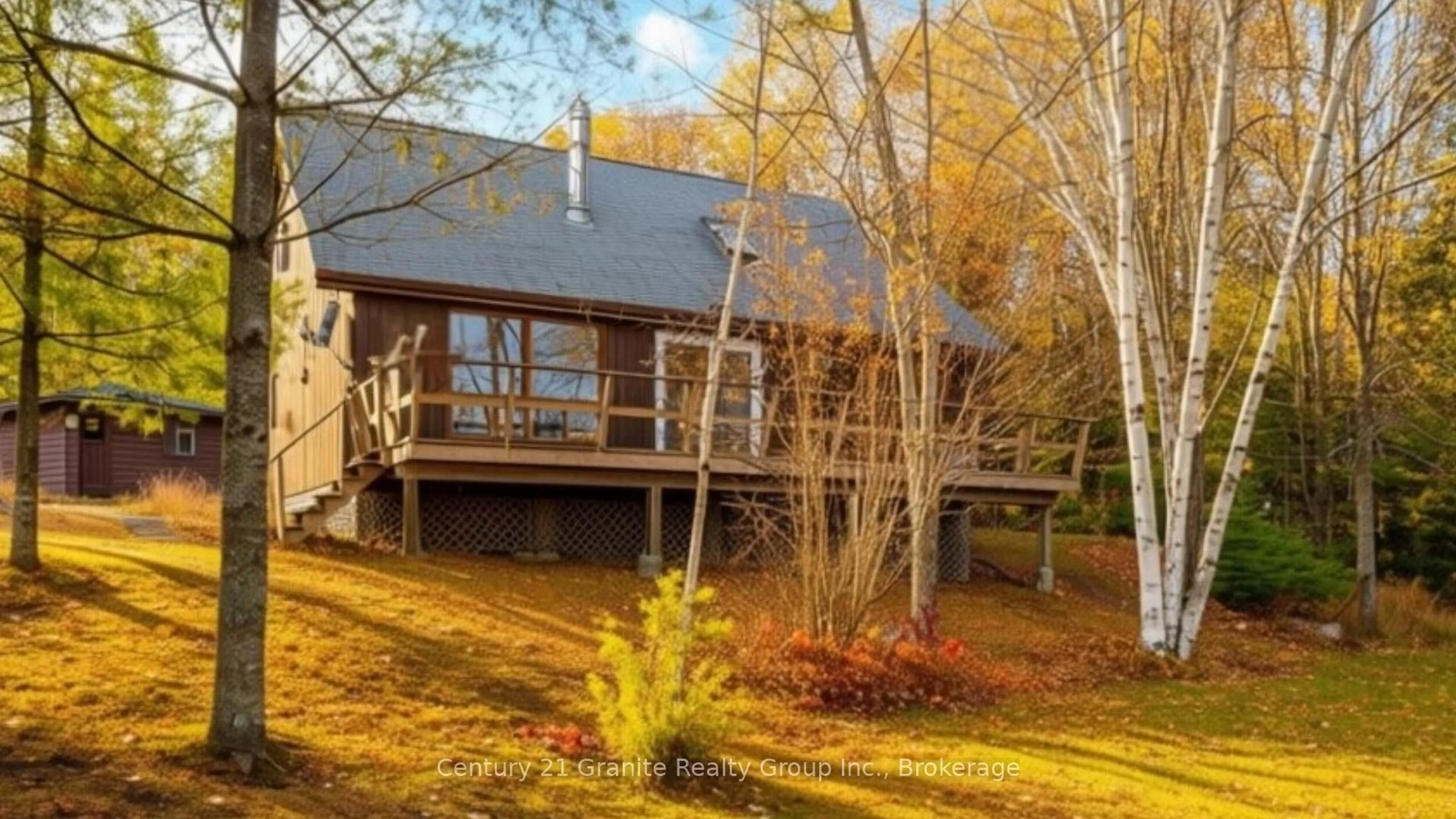 A pic from outside/outdoor area/front of a property/back of a property/a pic from drone, water/lake/river/ocean view for 1070 Glamorgan Rd, Highlands East Ontario K0M 1R0