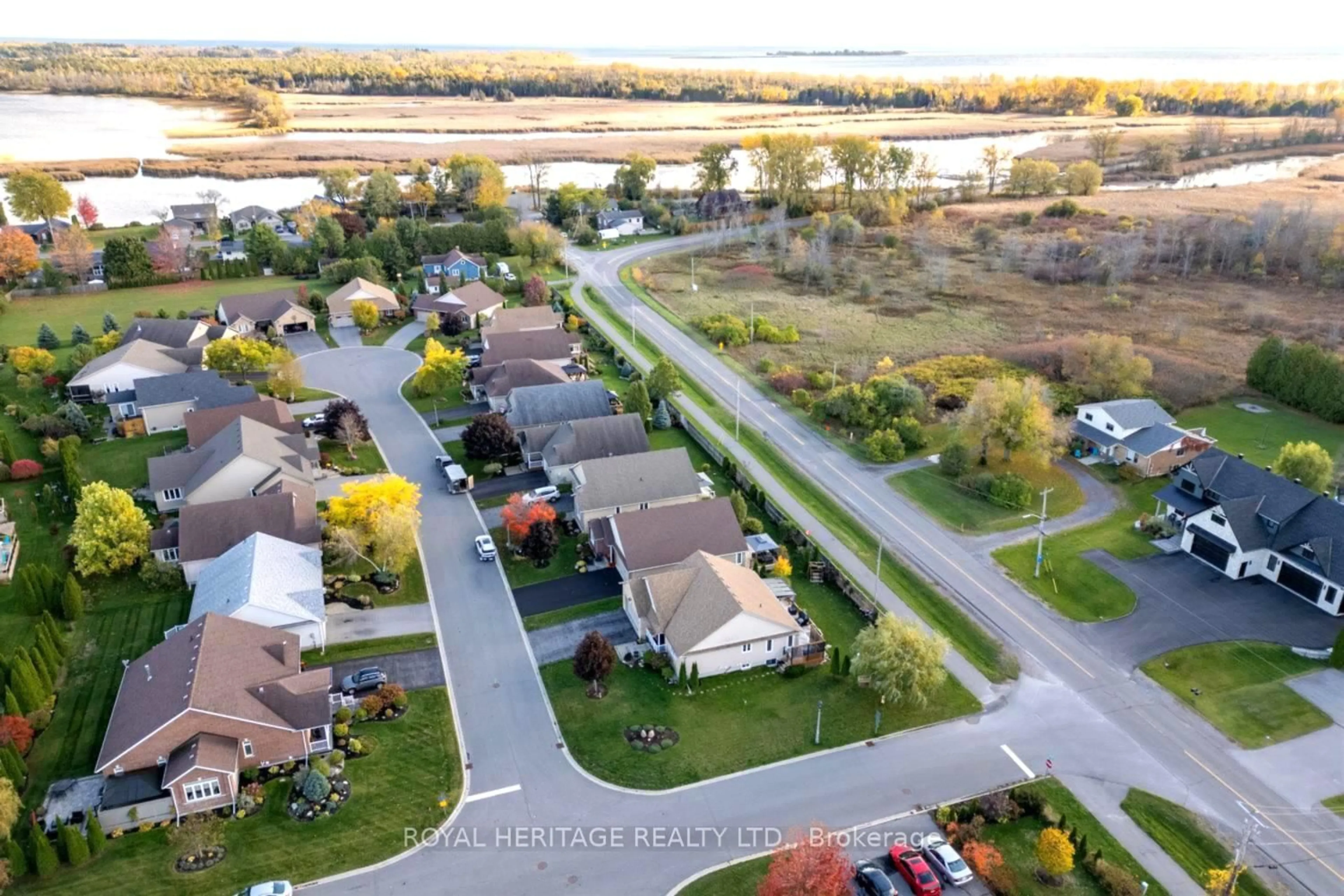A pic from outside/outdoor area/front of a property/back of a property/a pic from drone, water/lake/river/ocean view for 48 Ward Dr, Brighton Ontario K0K 1H0