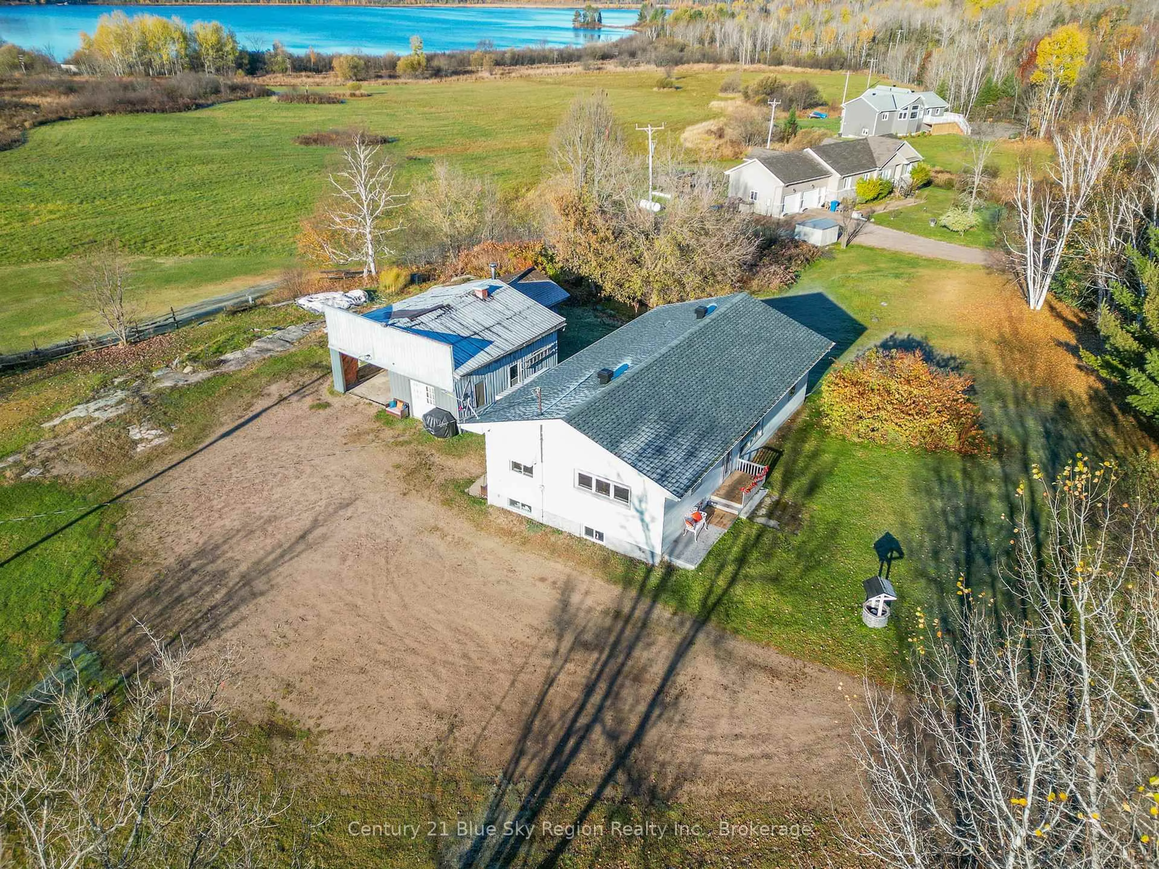 A pic from outside/outdoor area/front of a property/back of a property/a pic from drone, water/lake/river/ocean view for 1420 Quae Quae Rd, East Ferris Ontario P0H 1K0