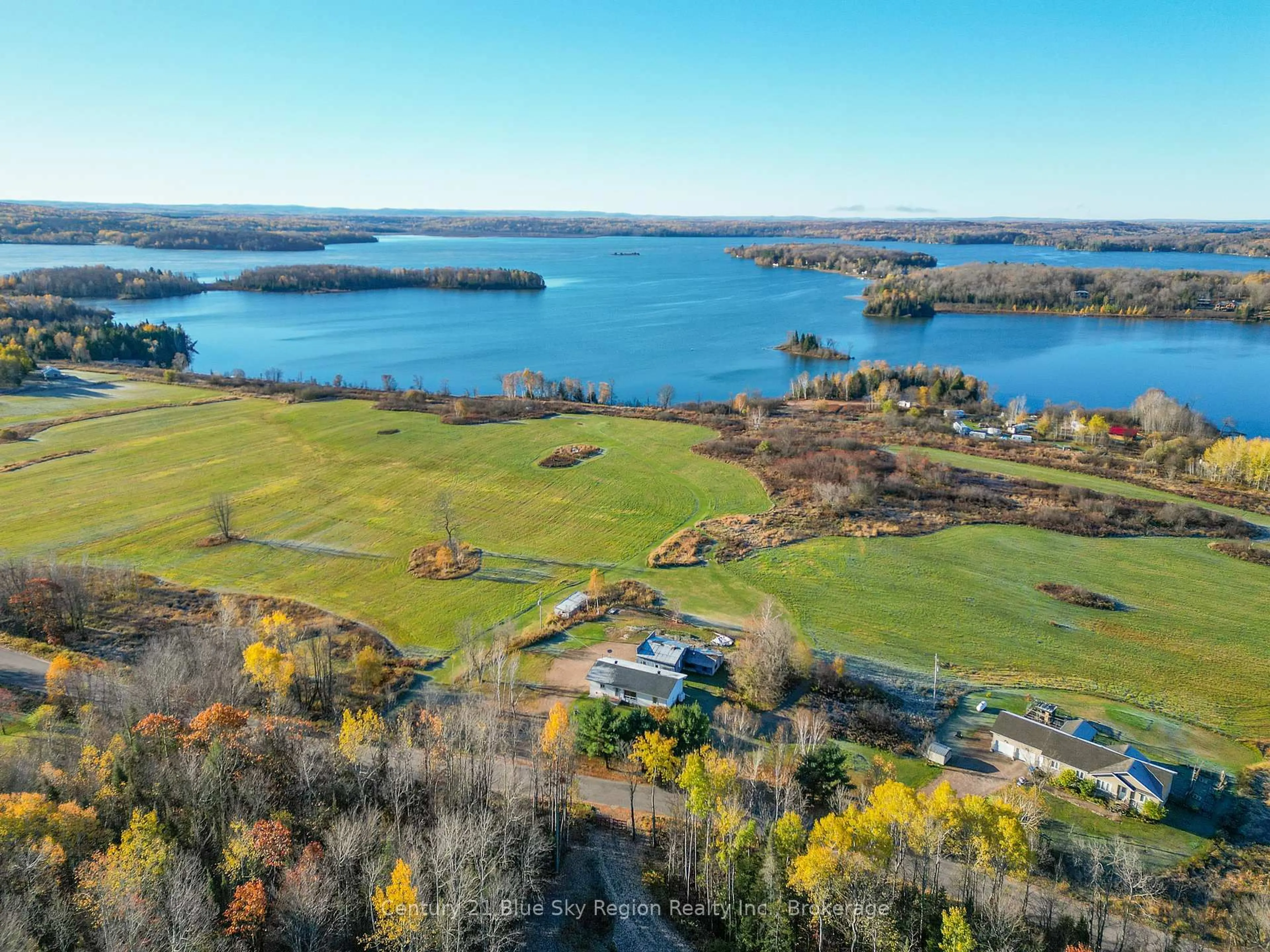 A pic from outside/outdoor area/front of a property/back of a property/a pic from drone, water/lake/river/ocean view for 1420 Quae Quae Rd, East Ferris Ontario P0H 1K0