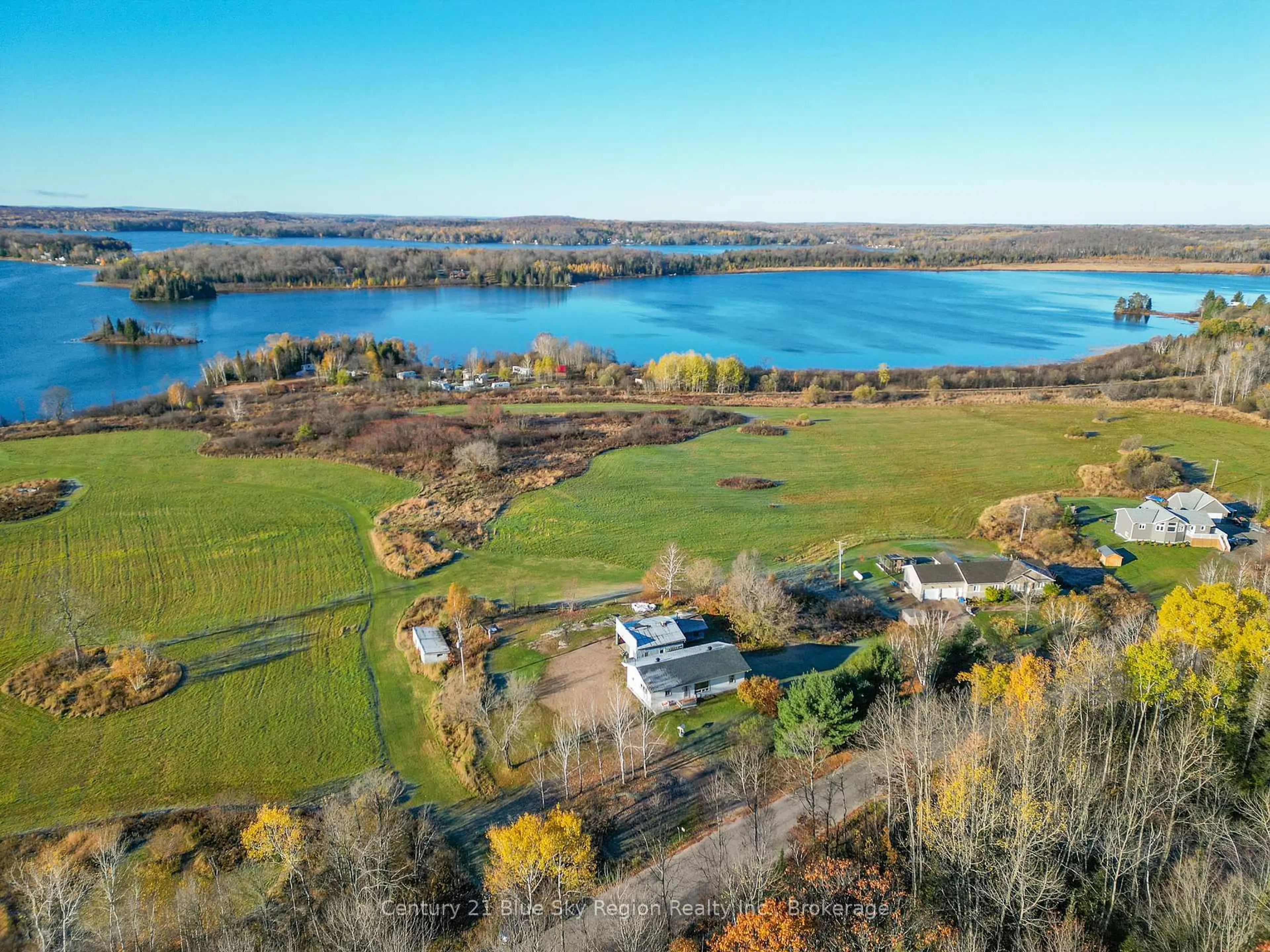 A pic from outside/outdoor area/front of a property/back of a property/a pic from drone, water/lake/river/ocean view for 1420 Quae Quae Rd, East Ferris Ontario P0H 1K0