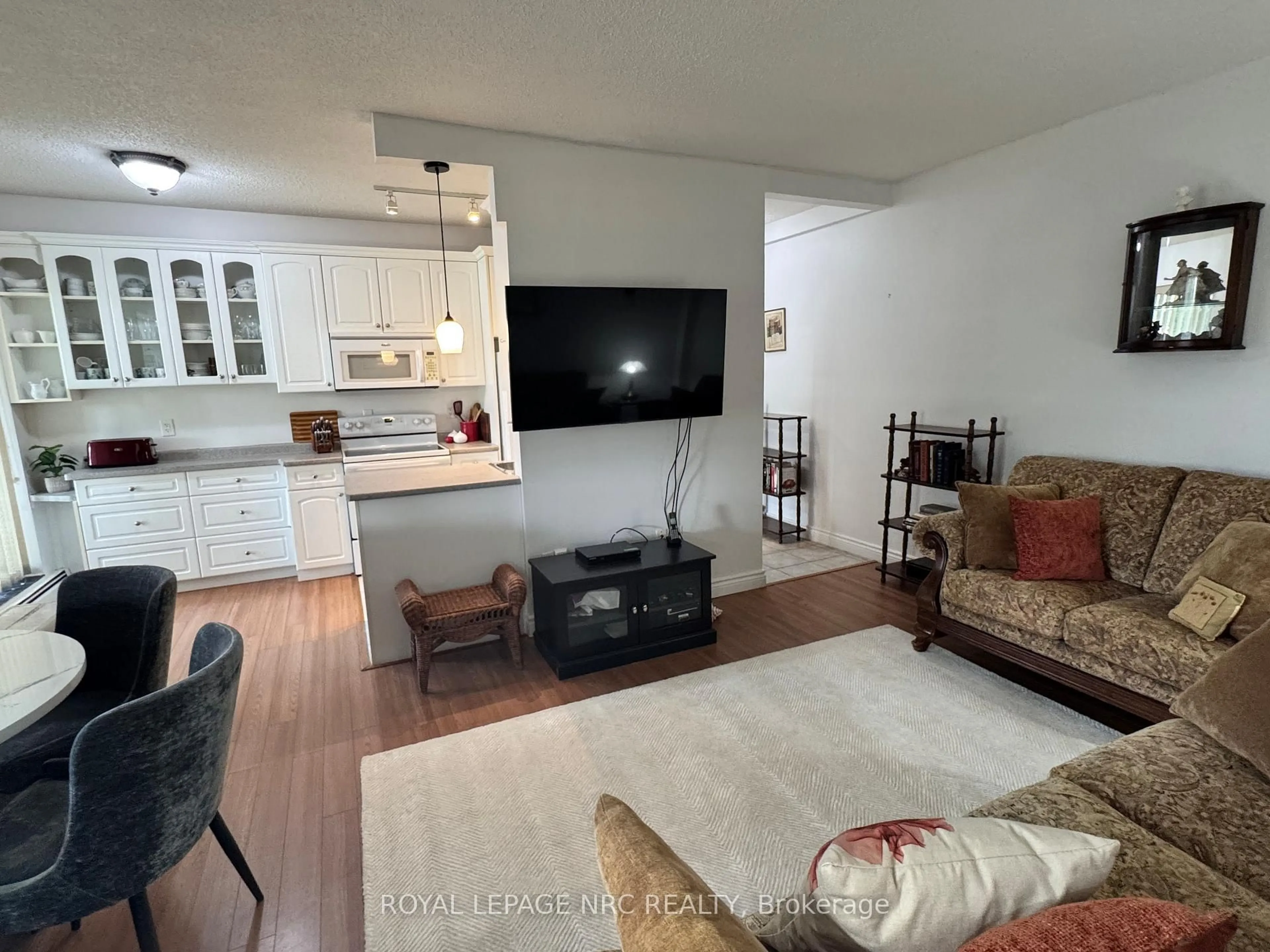 Living room with furniture, unknown for 6390 Huggins St #101, Niagara Falls Ontario L2J 1H1