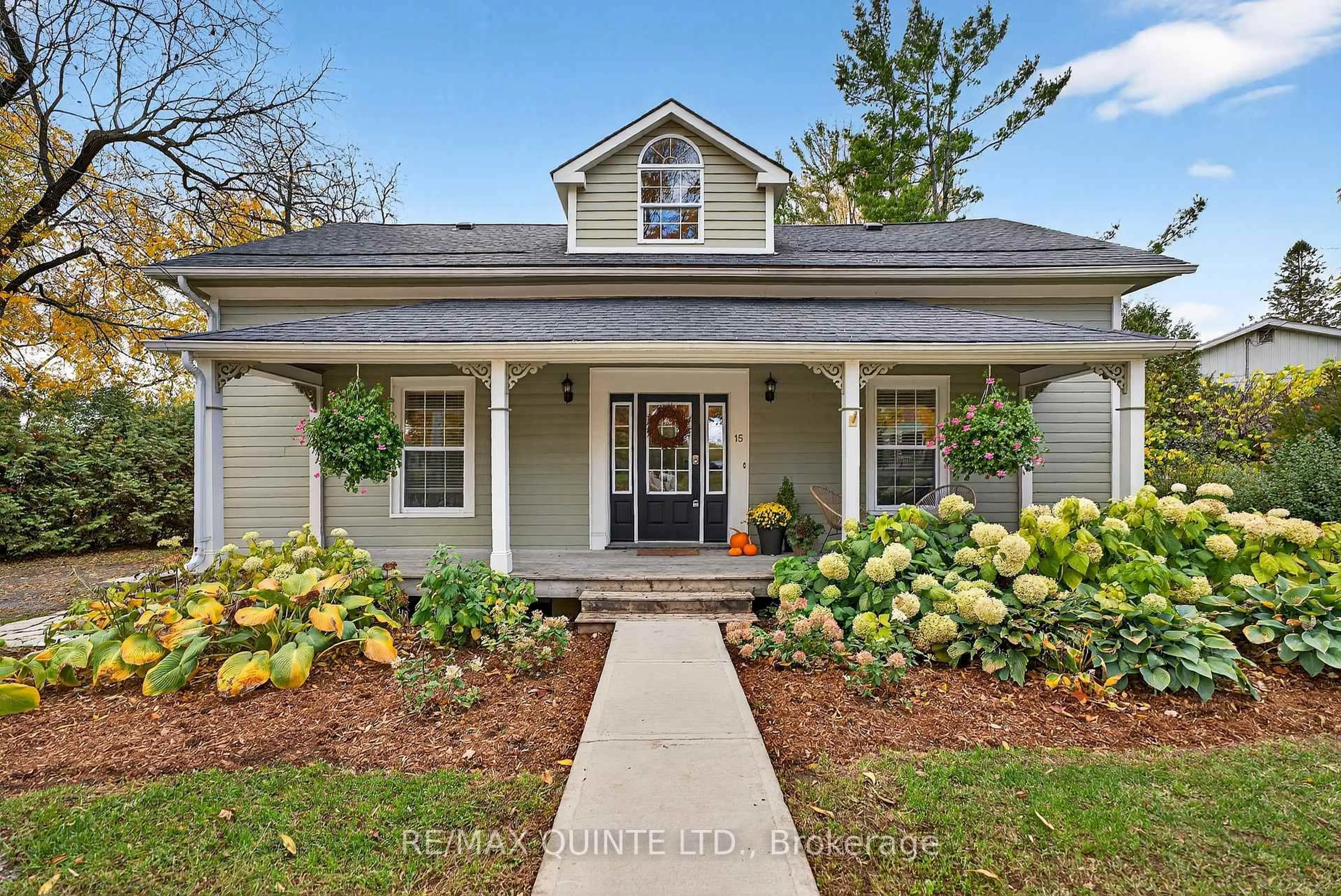 Home with vinyl exterior material, street for 15 Talbot St, Prince Edward County Ontario K0K 2T0