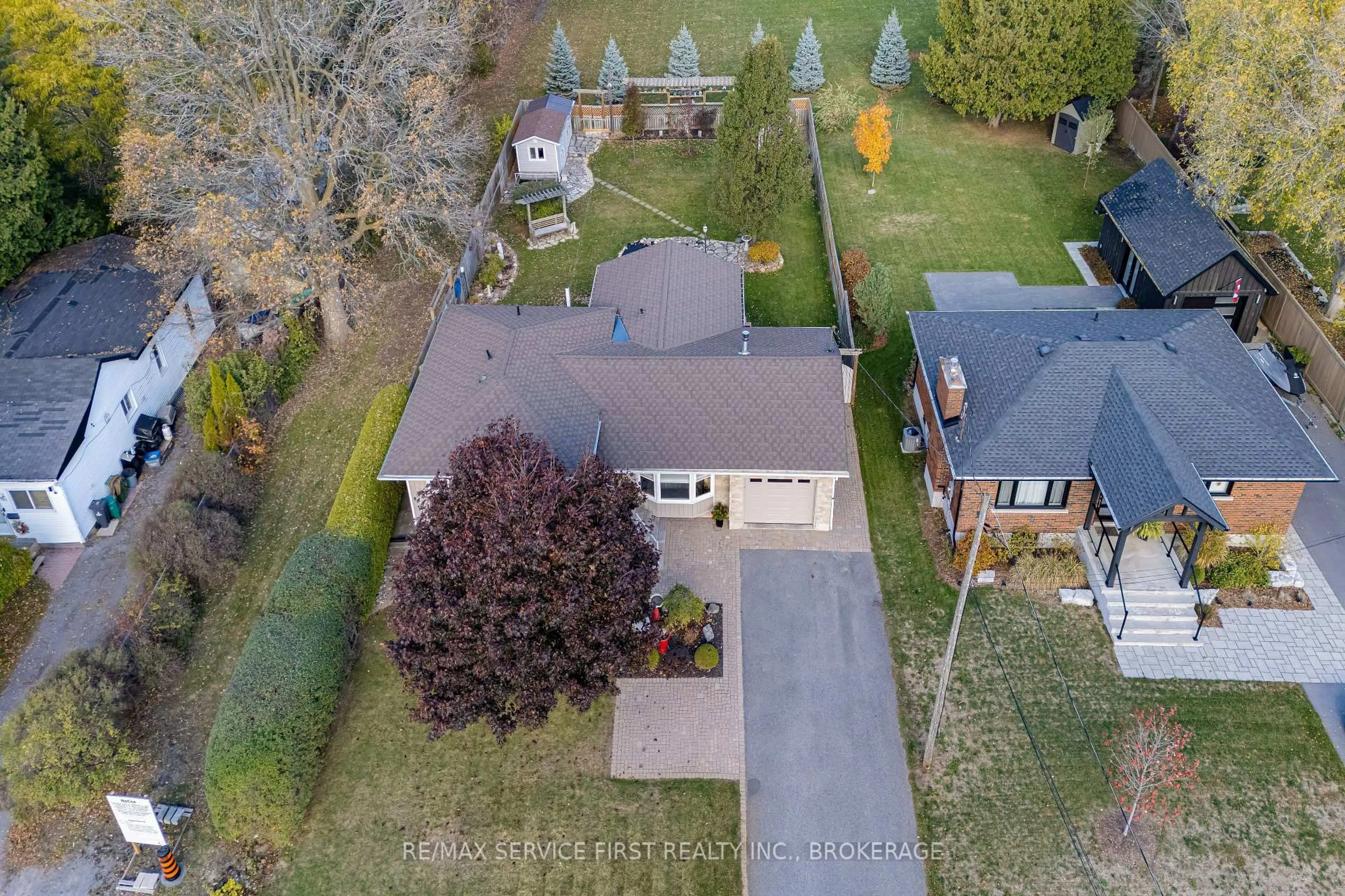A pic from outside/outdoor area/front of a property/back of a property/a pic from drone, street for 998 Woodbine Rd, Kingston Ontario K7P 2V9