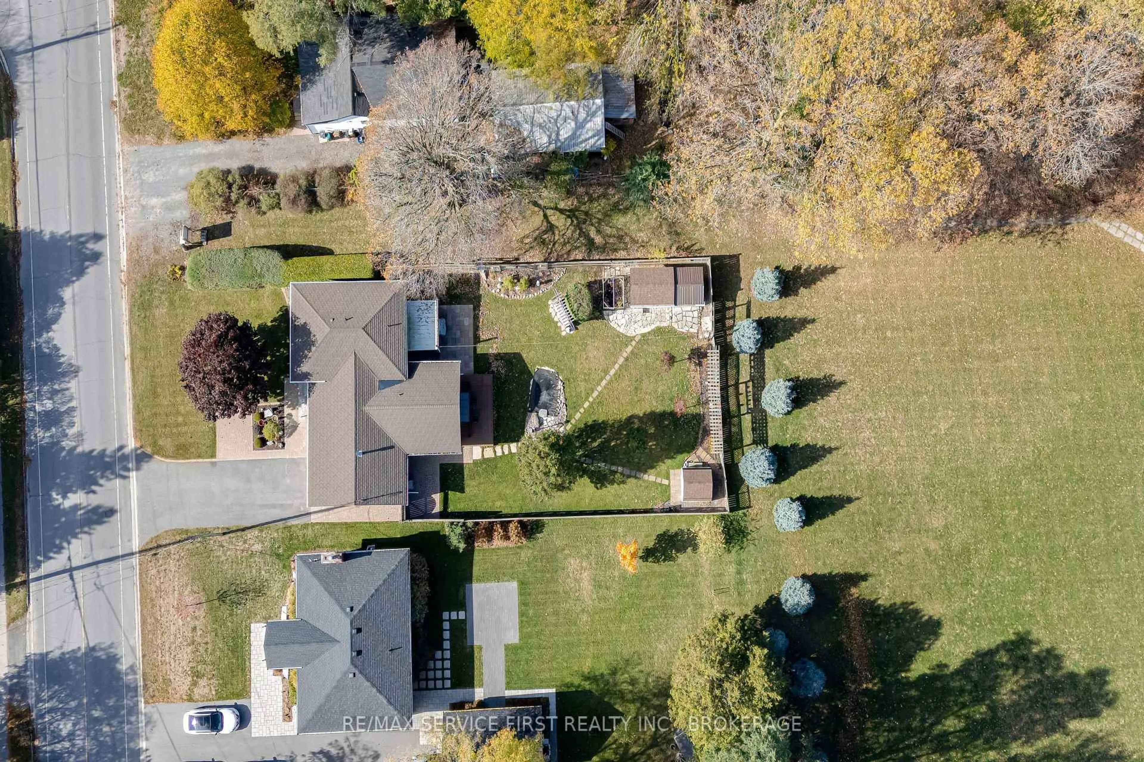 A pic from outside/outdoor area/front of a property/back of a property/a pic from drone, street for 998 Woodbine Rd, Kingston Ontario K7P 2V9