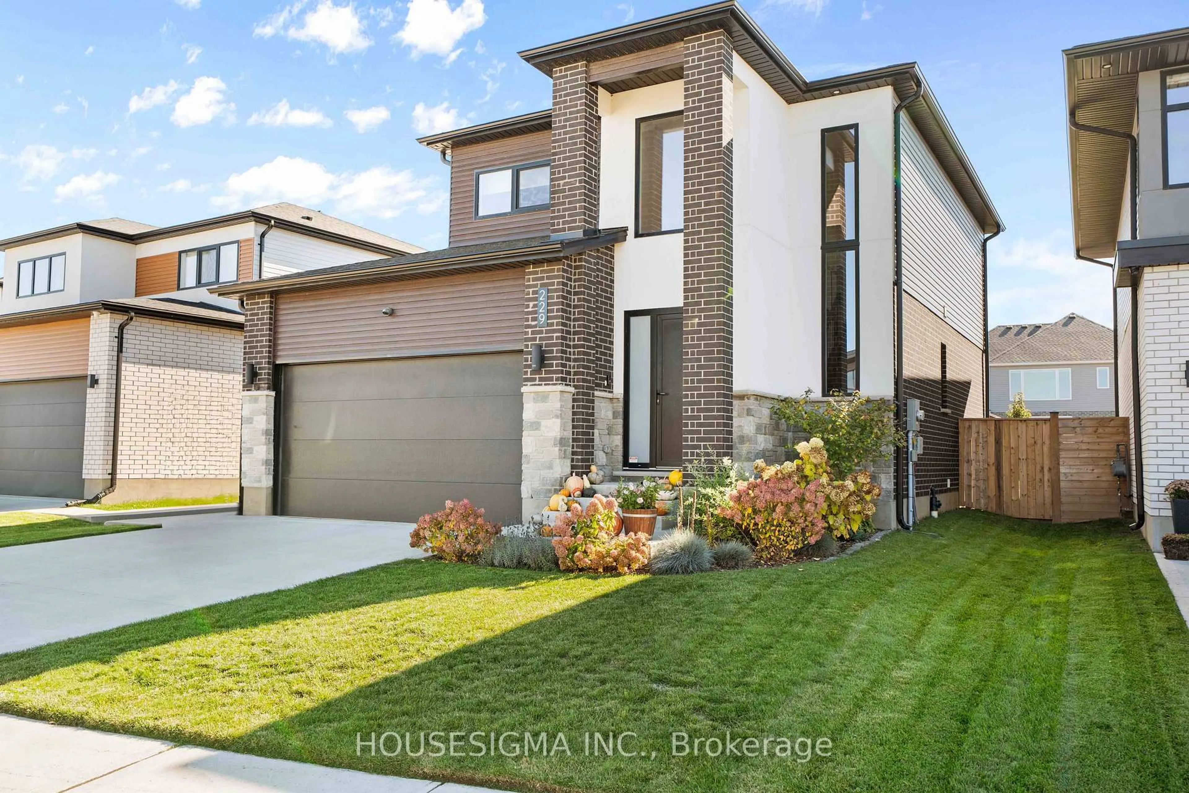 Home with brick exterior material, street for 229 Crestview Dr, Middlesex Centre Ontario N0L 1R0
