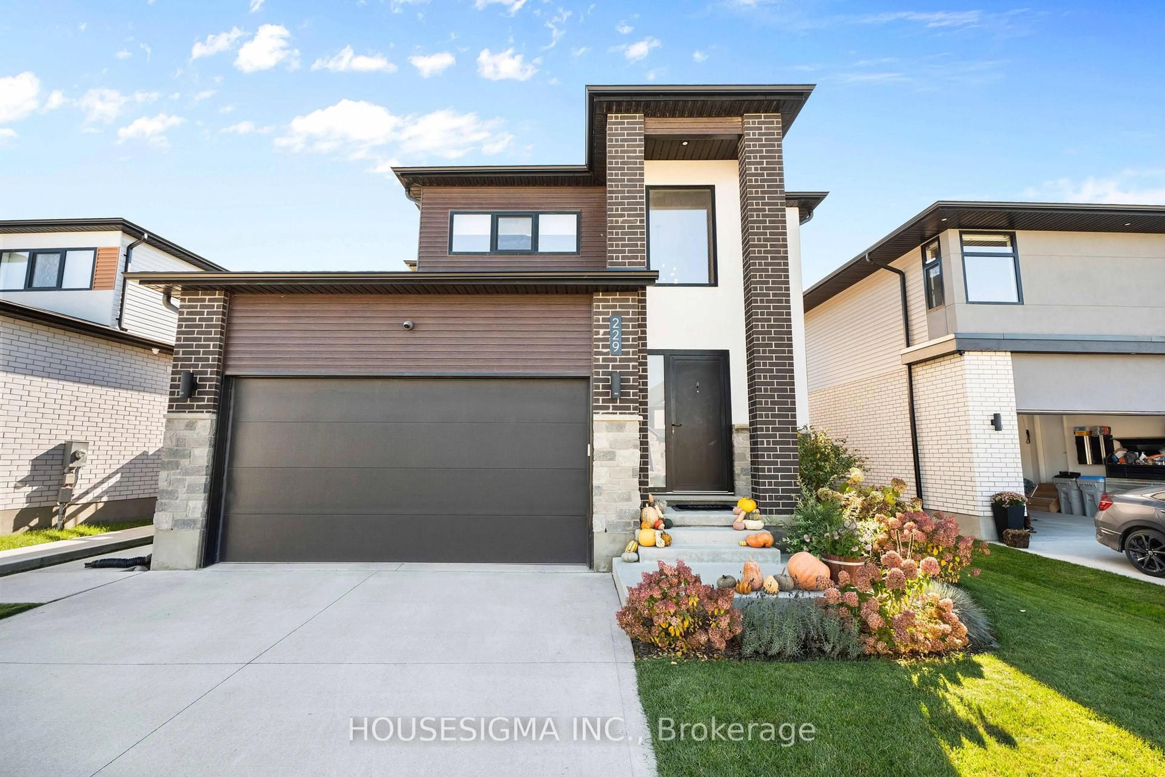 Home with brick exterior material, street for 229 Crestview Dr, Middlesex Centre Ontario N0L 1R0