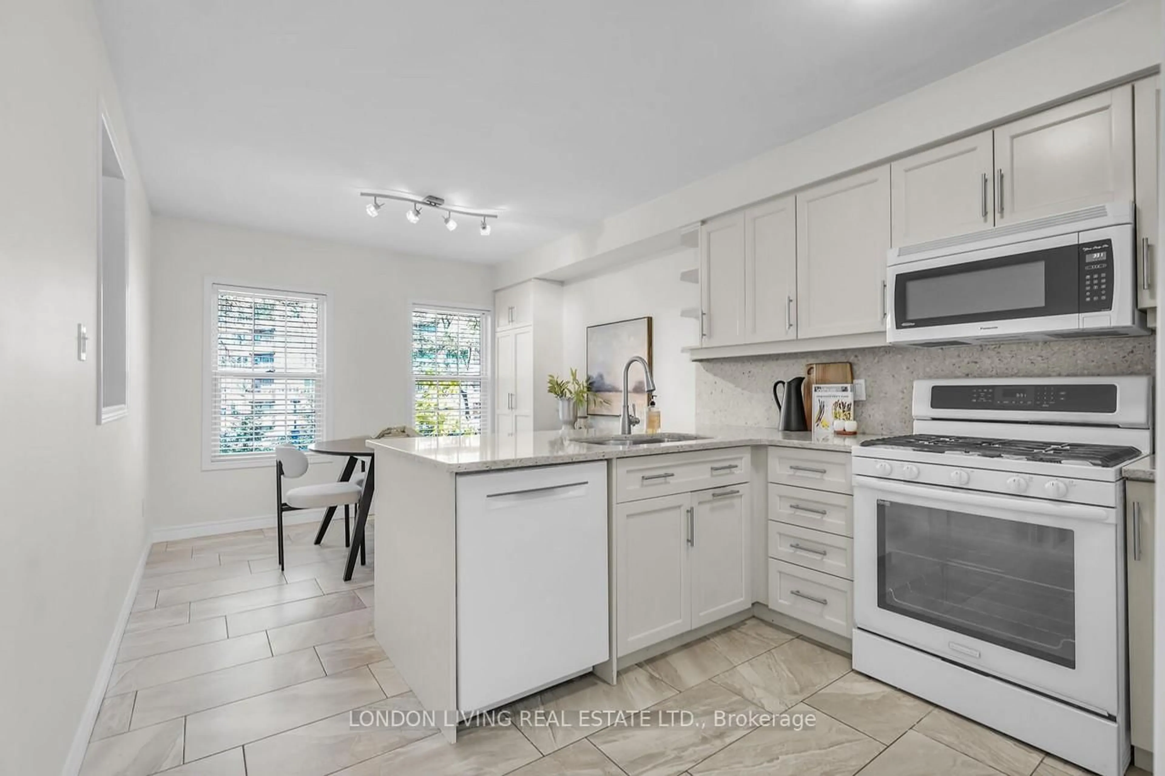 Open concept kitchen, ceramic/tile floor for 30 Grand Ave #21, London South Ontario N6C 1K8