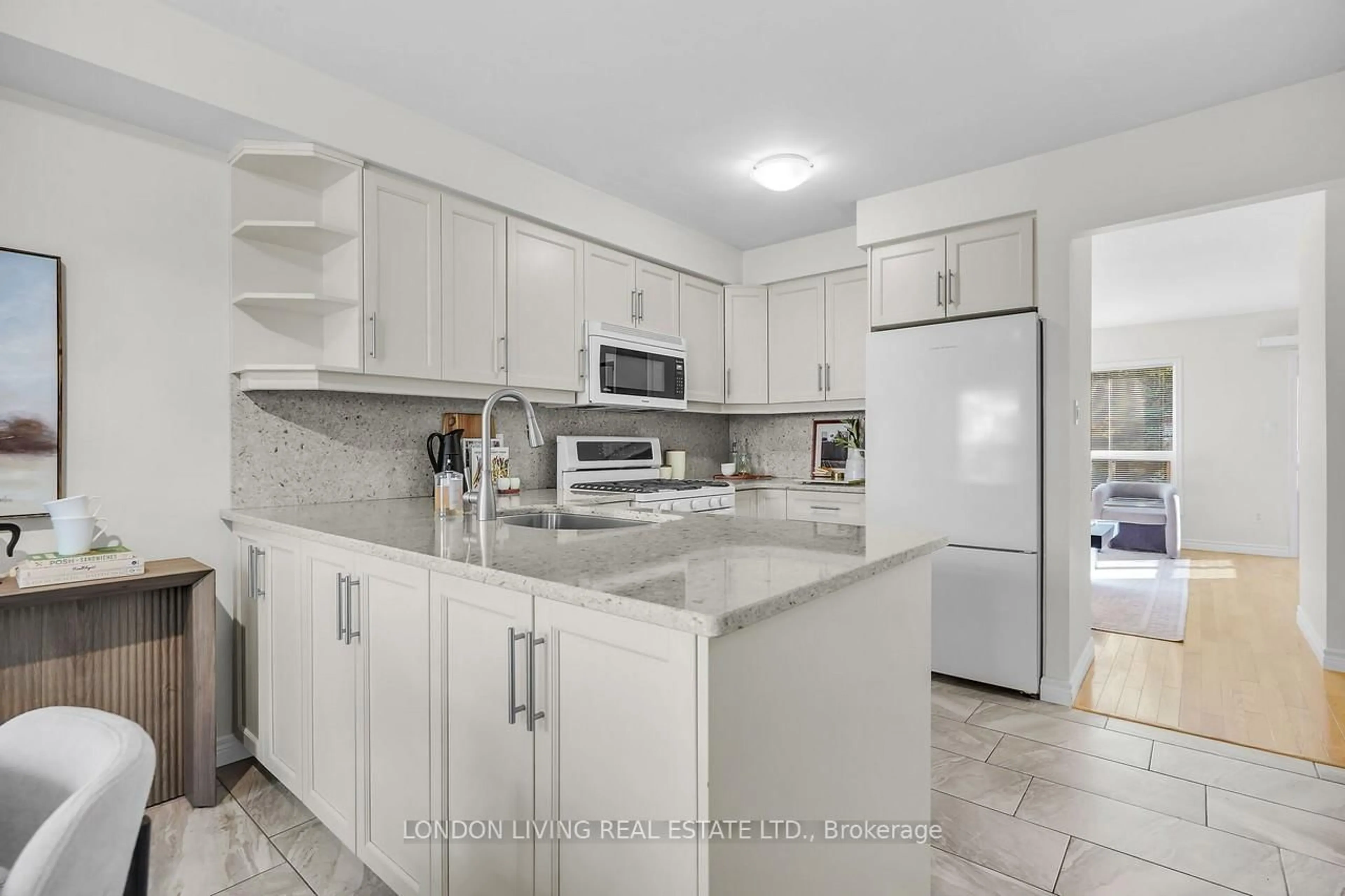 Open concept kitchen, ceramic/tile floor for 30 Grand Ave #21, London South Ontario N6C 1K8