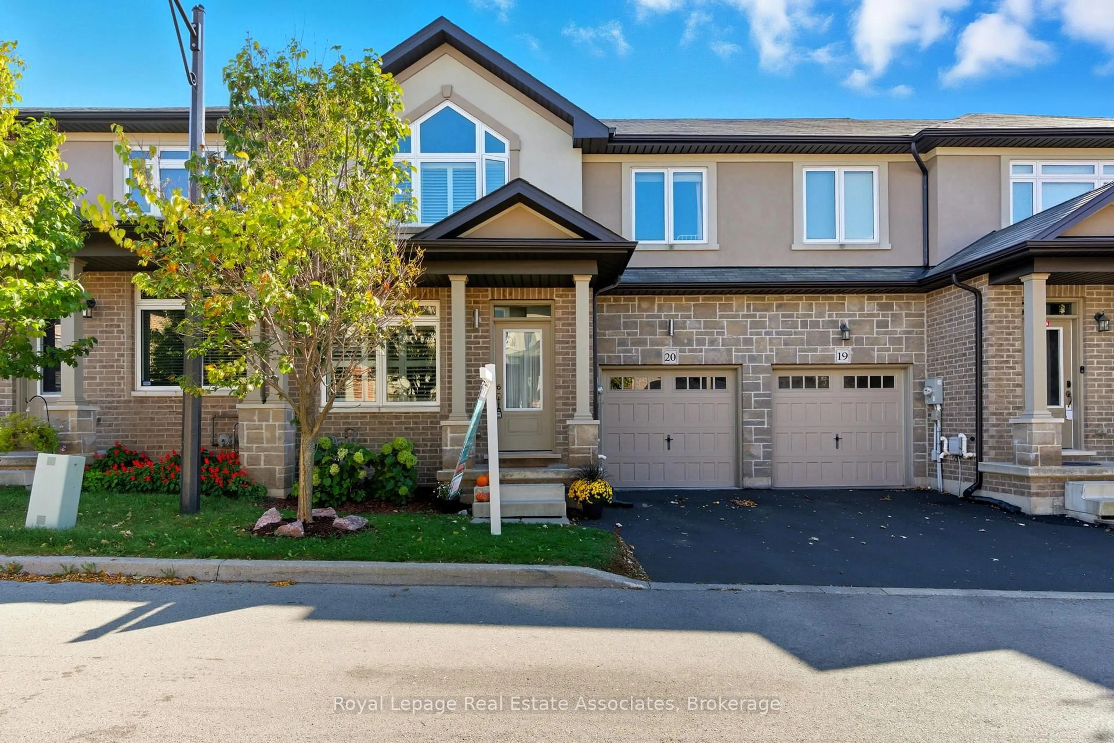 Home with brick exterior material, street for 421 Kitty Murray Lane #20, Hamilton Ontario L9K 0J5