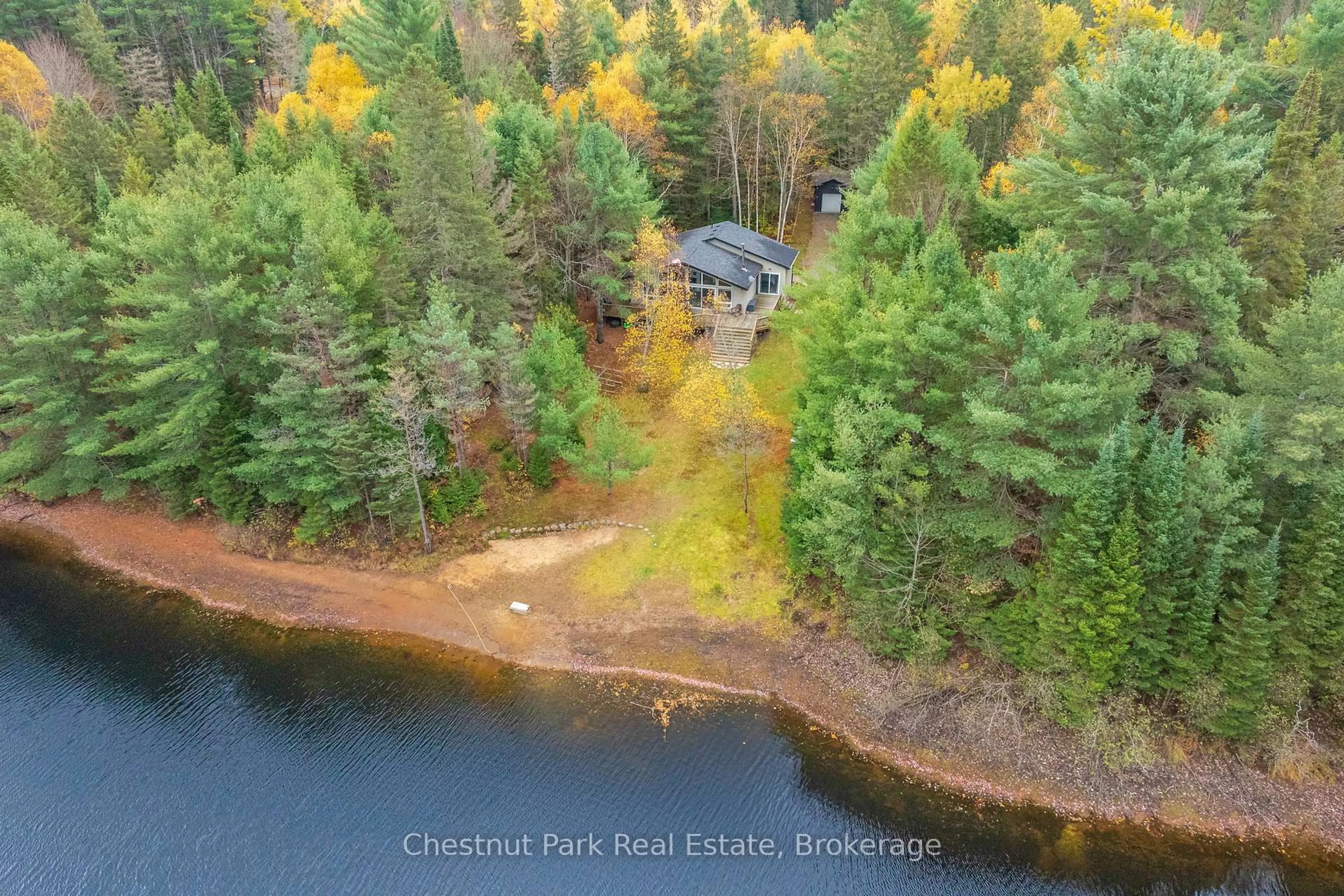 A pic from outside/outdoor area/front of a property/back of a property/a pic from drone, water/lake/river/ocean view for 529 Balsam Chutes Rd, Huntsville Ontario P0B 1L0