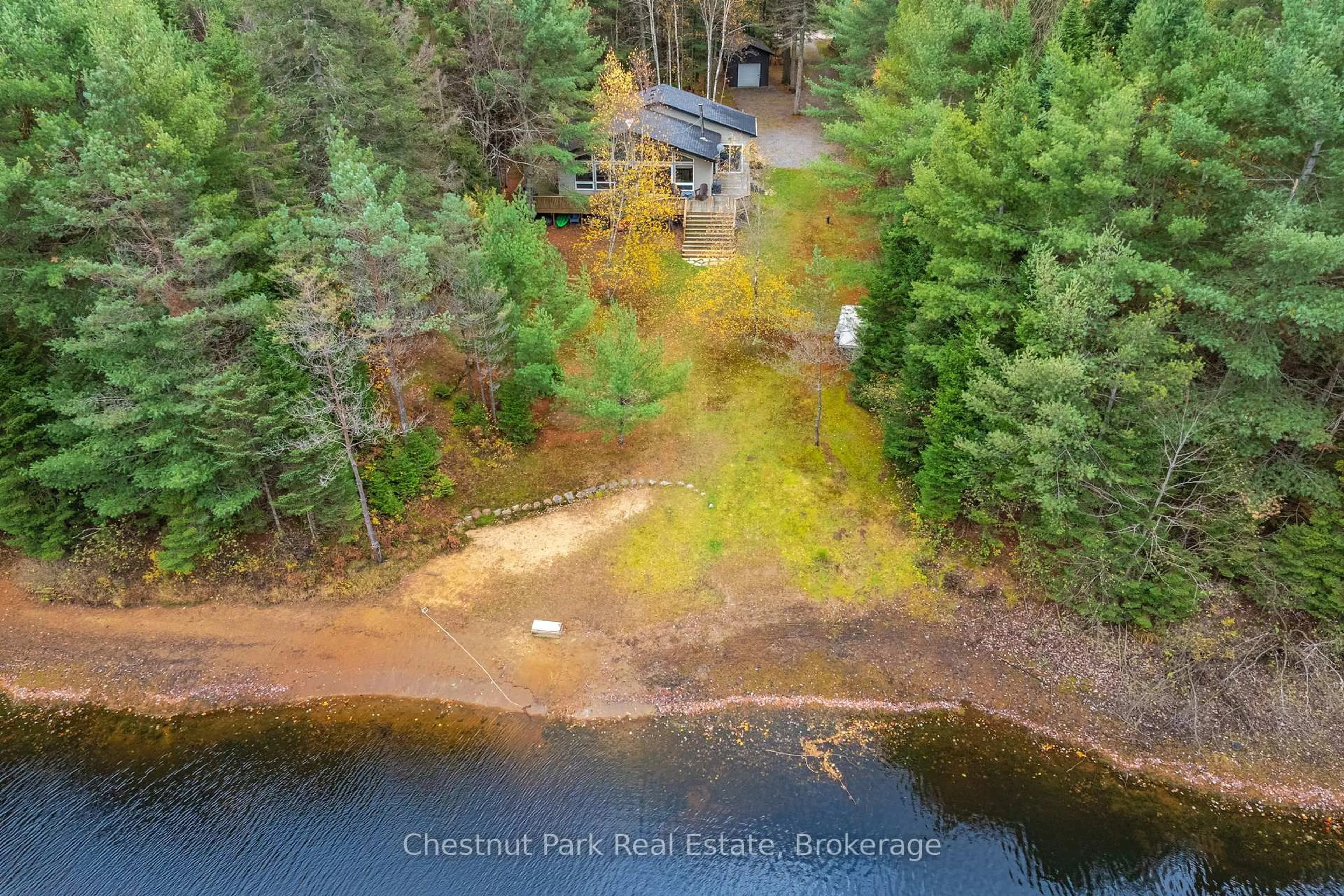 A pic from outside/outdoor area/front of a property/back of a property/a pic from drone, water/lake/river/ocean view for 529 Balsam Chutes Rd, Huntsville Ontario P0B 1L0