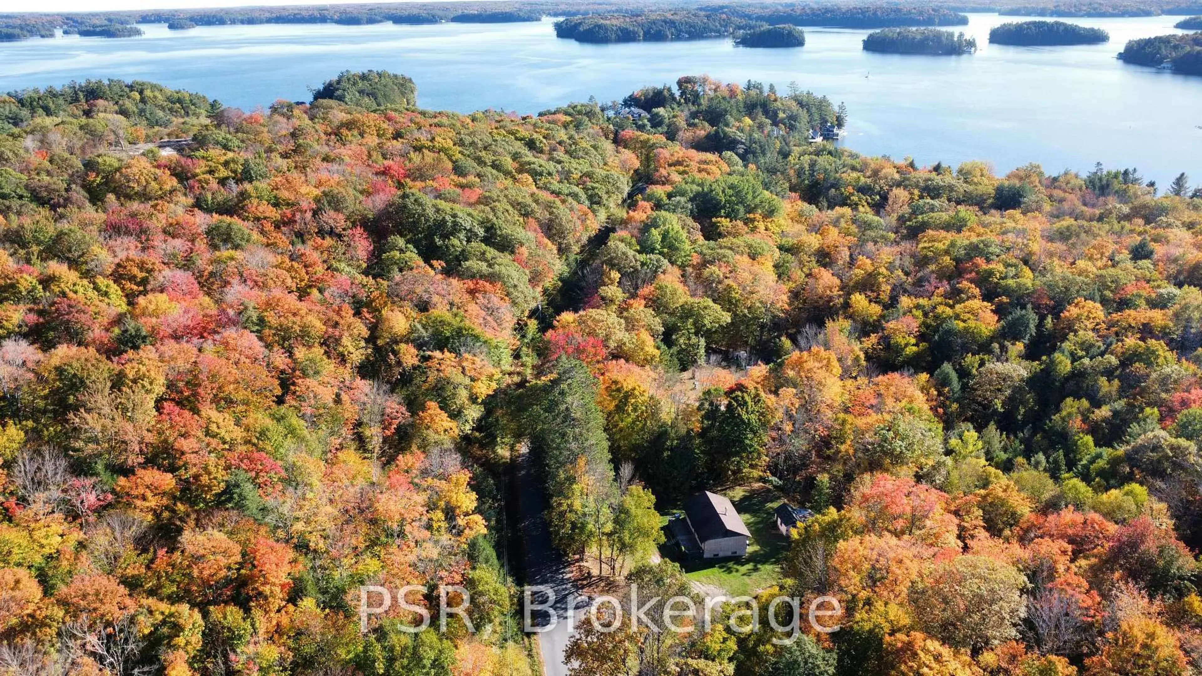 A pic from outside/outdoor area/front of a property/back of a property/a pic from drone, water/lake/river/ocean view for 1094 Morinus Rd, Muskoka Lakes Ontario P0B 1J0