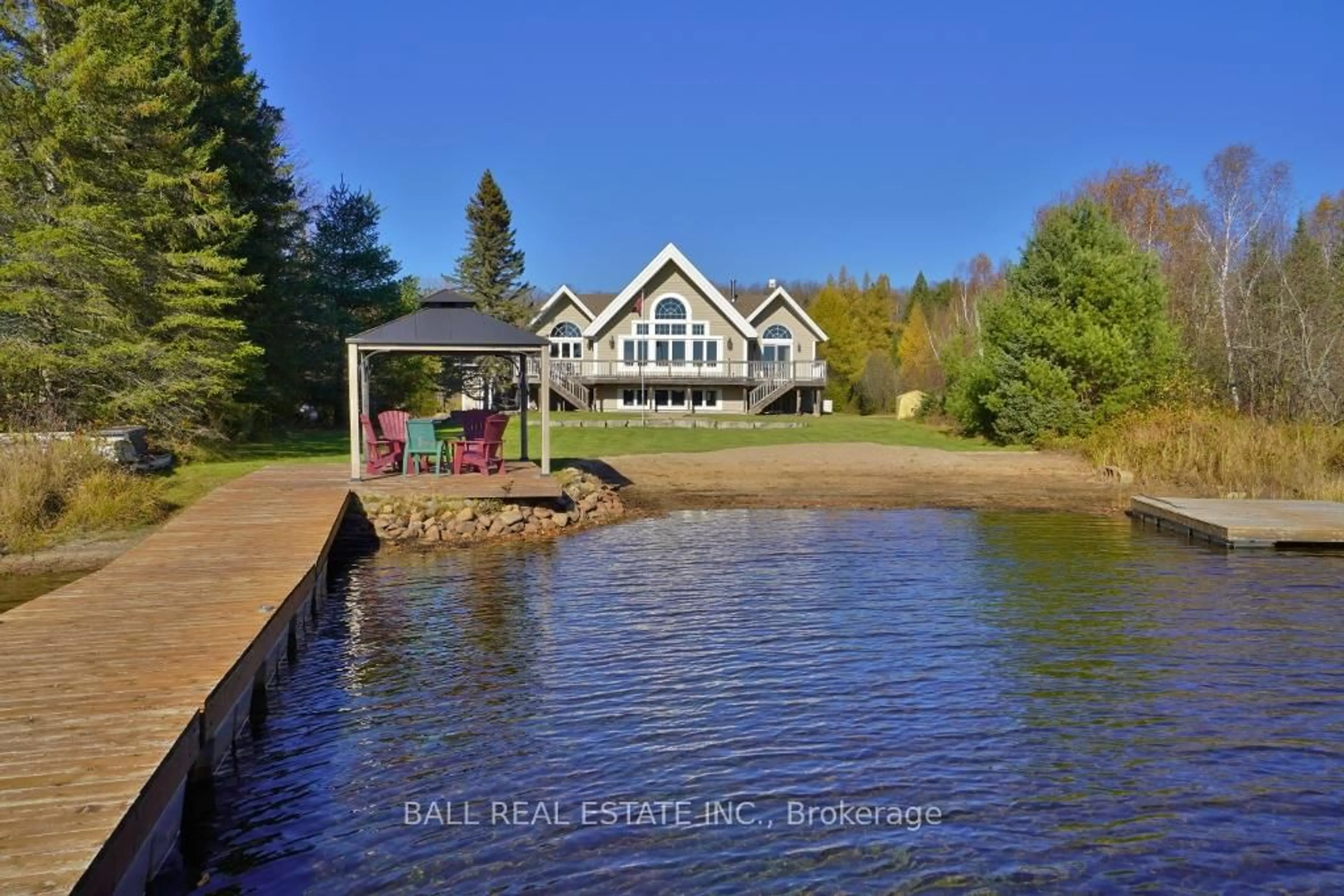 A pic from outside/outdoor area/front of a property/back of a property/a pic from drone, water/lake/river/ocean view for 1030 Wapiti Cl Clse, Highlands East Ontario K0L 2A0