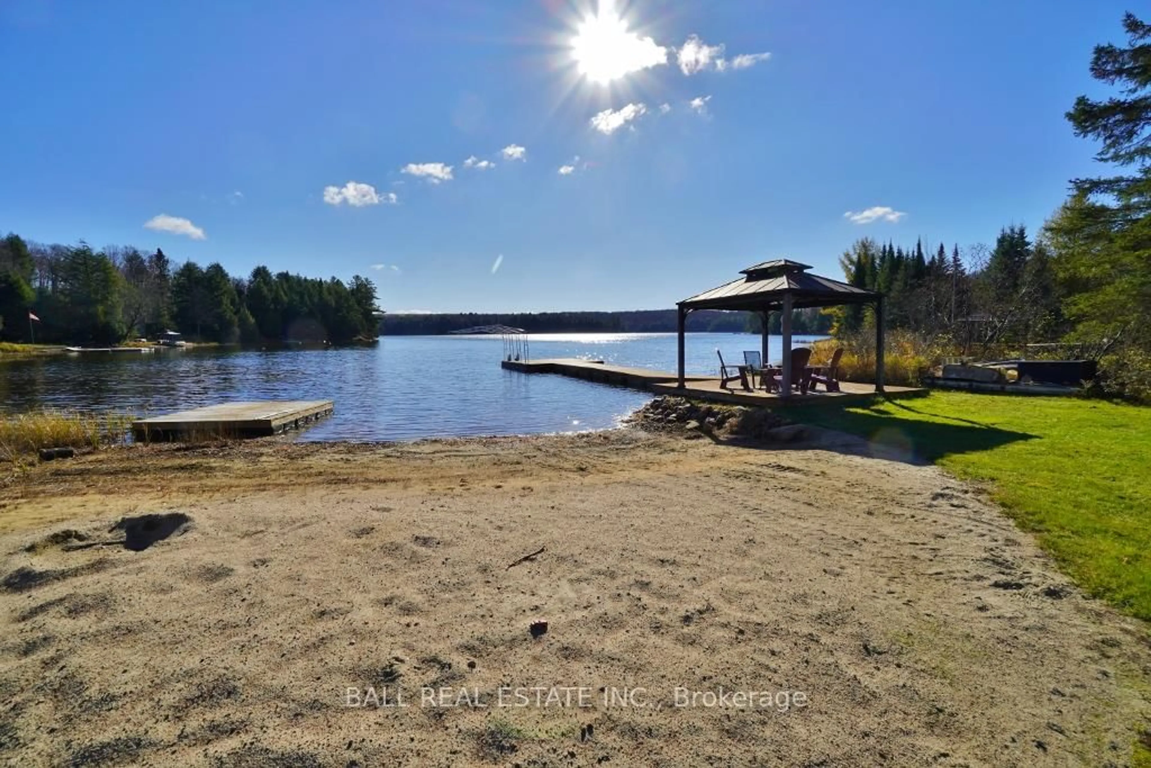 A pic from outside/outdoor area/front of a property/back of a property/a pic from drone, water/lake/river/ocean view for 1030 Wapiti Cl Clse, Highlands East Ontario K0L 2A0
