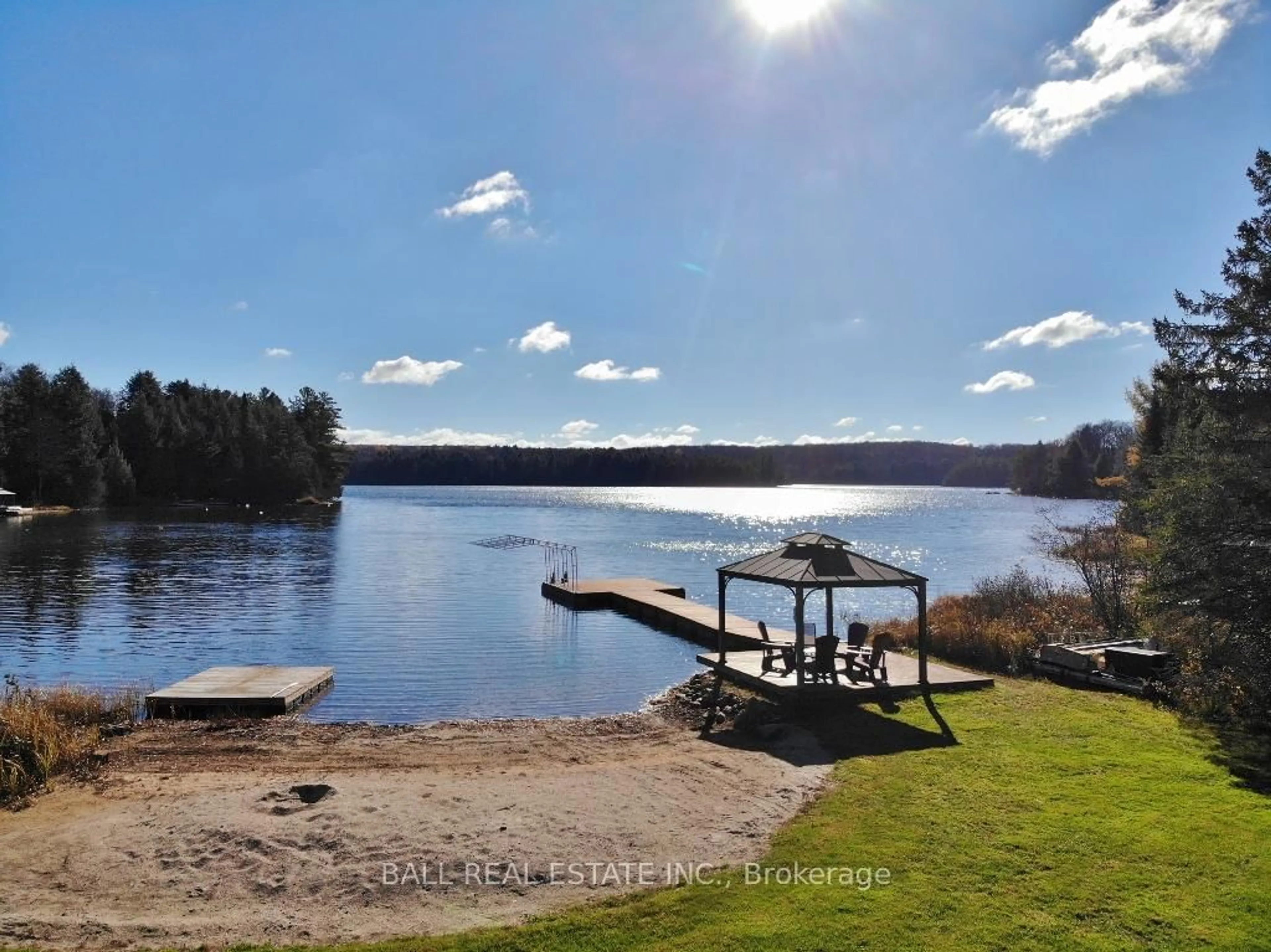 A pic from outside/outdoor area/front of a property/back of a property/a pic from drone, water/lake/river/ocean view for 1030 Wapiti Cl Clse, Highlands East Ontario K0L 2A0