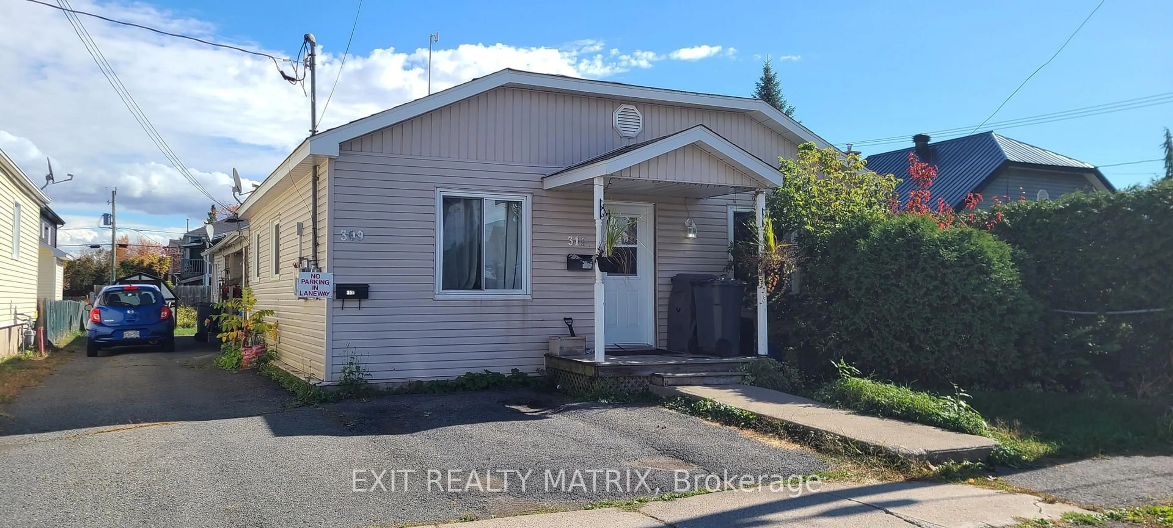 Home with vinyl exterior material, street for 309-311 Salisbury St, Hawkesbury Ontario K6A 2P5