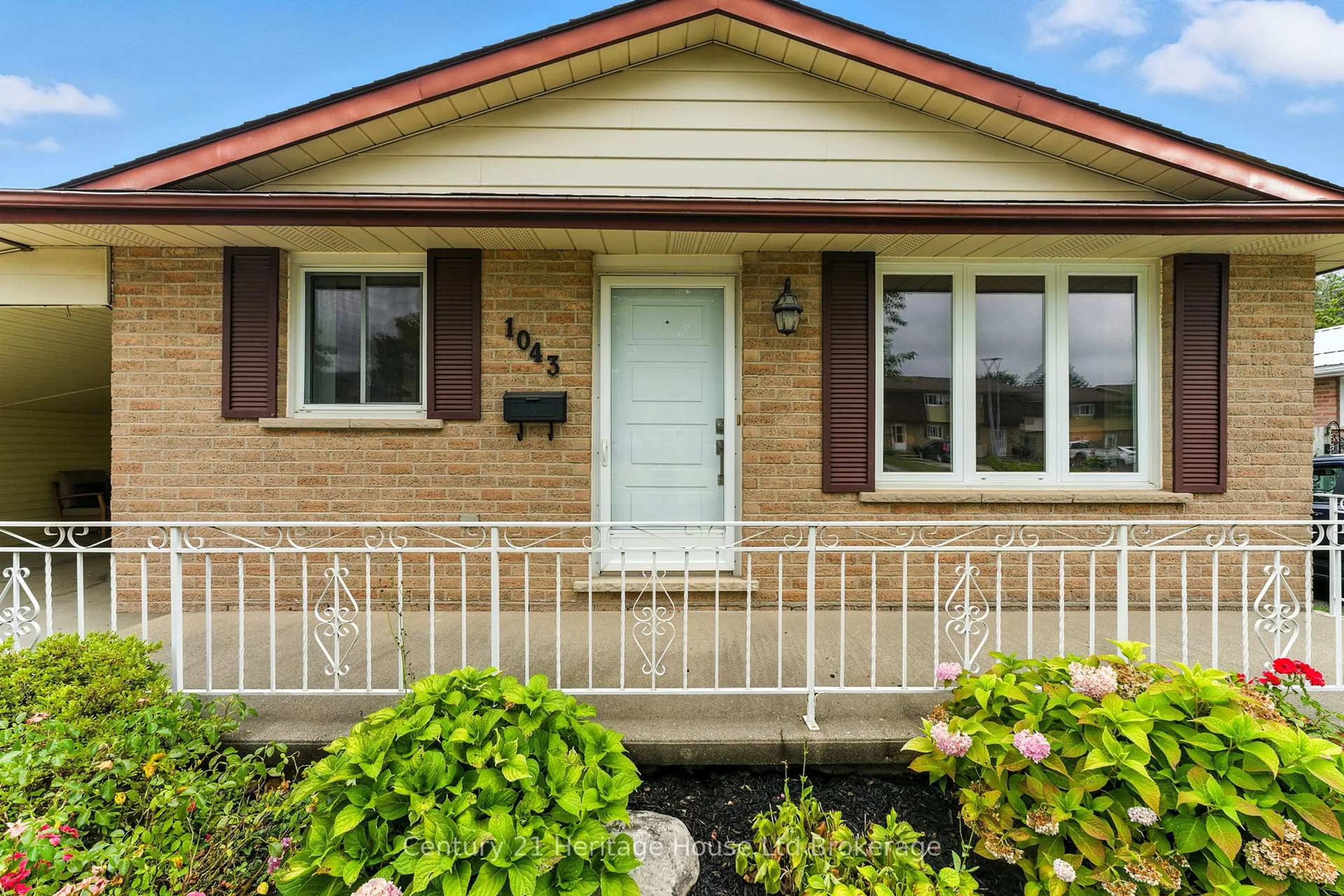 Home with brick exterior material, street for 1043 Canfield Cres, Woodstock Ontario N4S 8P3